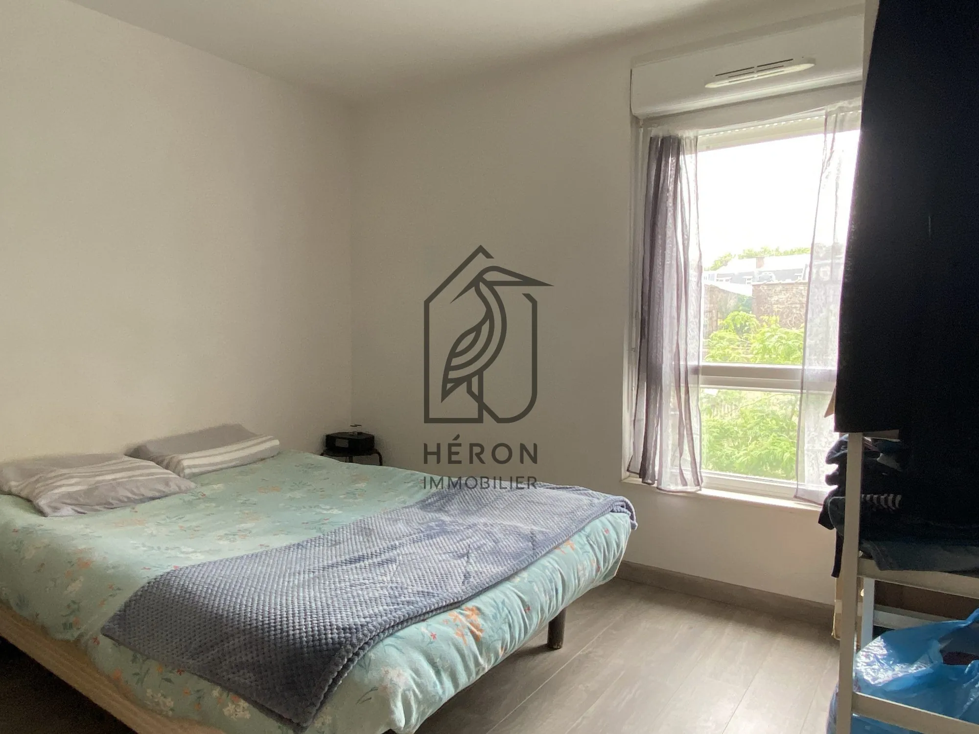 Appartement 2 pièces avec balcon et parking sécurisé à Roubaix 