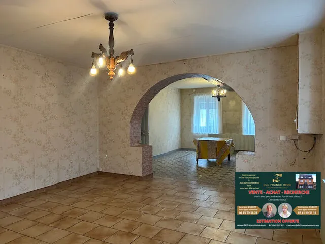 Grande maison semi-individuelle à Berlaimont avec potentiel et grand garage 