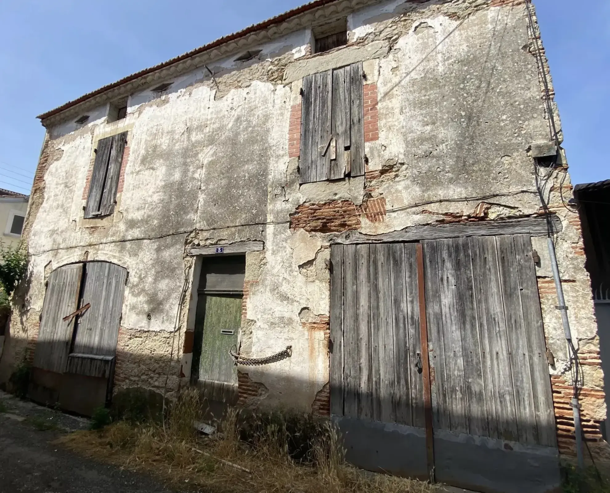 Petite maison en pierre à restaurer à Villeneuve-sur-Lot, 50 m² avec cour 