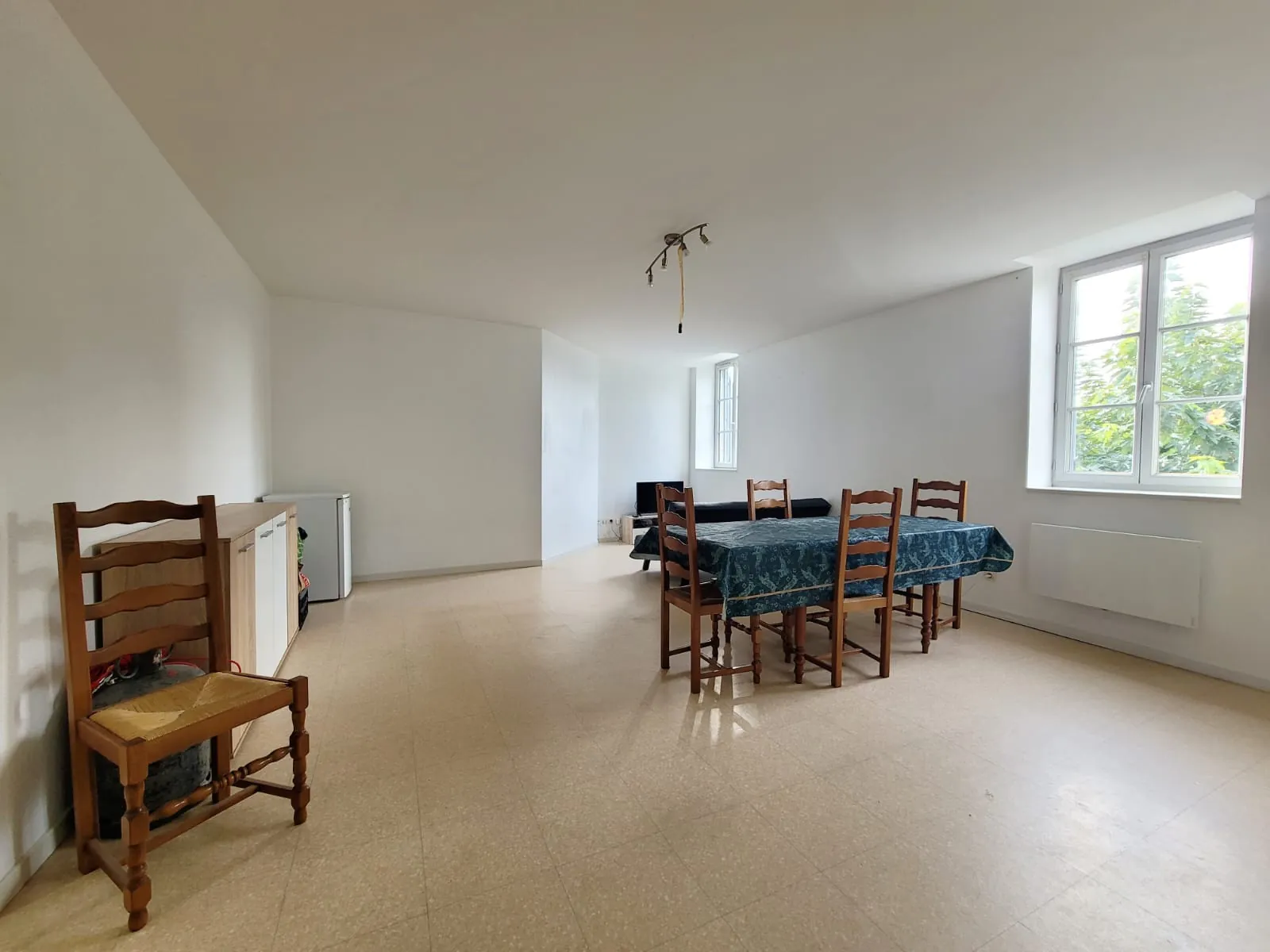 Vente duplex en hypercentre de Jassans-Riottier avec stationnement privatif 