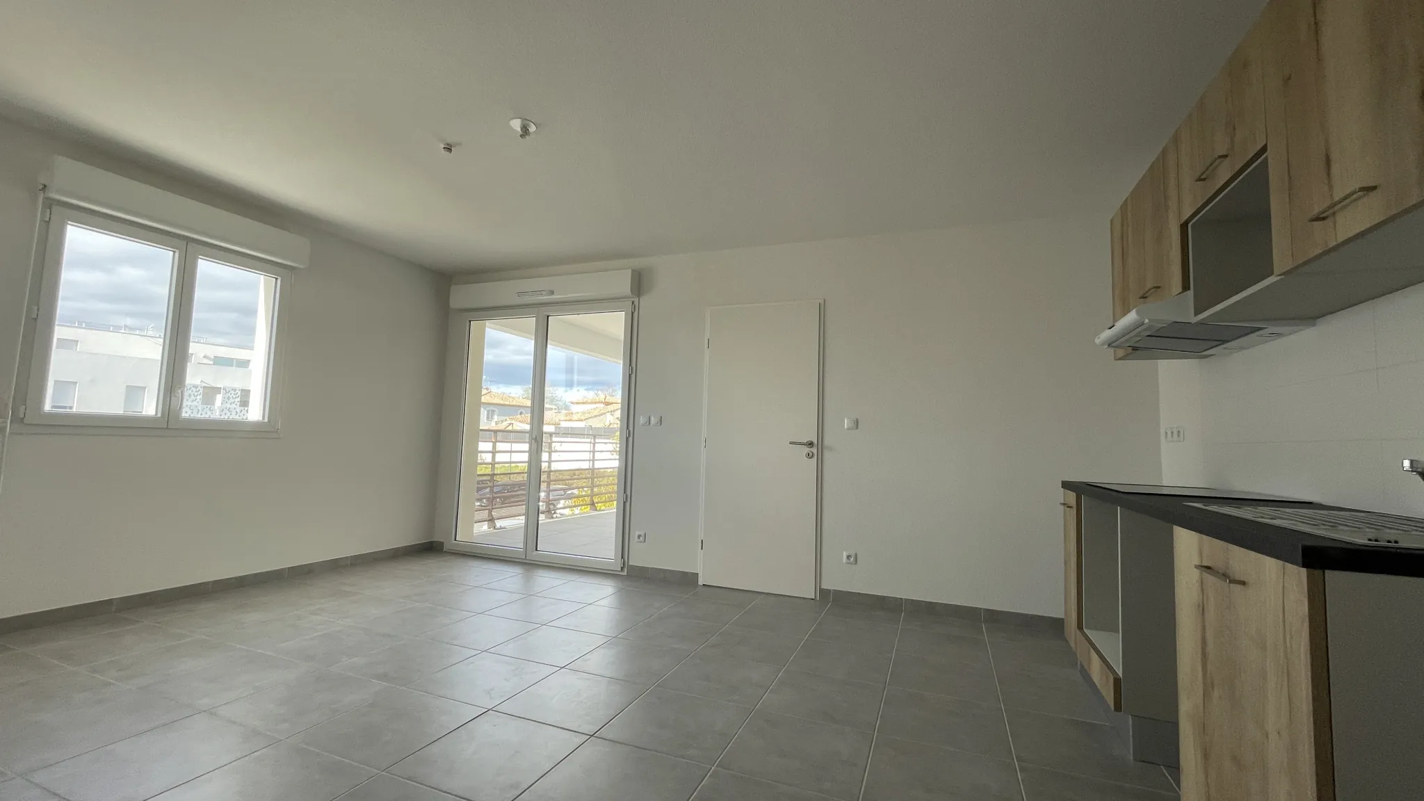 Appartement T3 à Béziers avec terrasse et parking, faible consommation énergétique