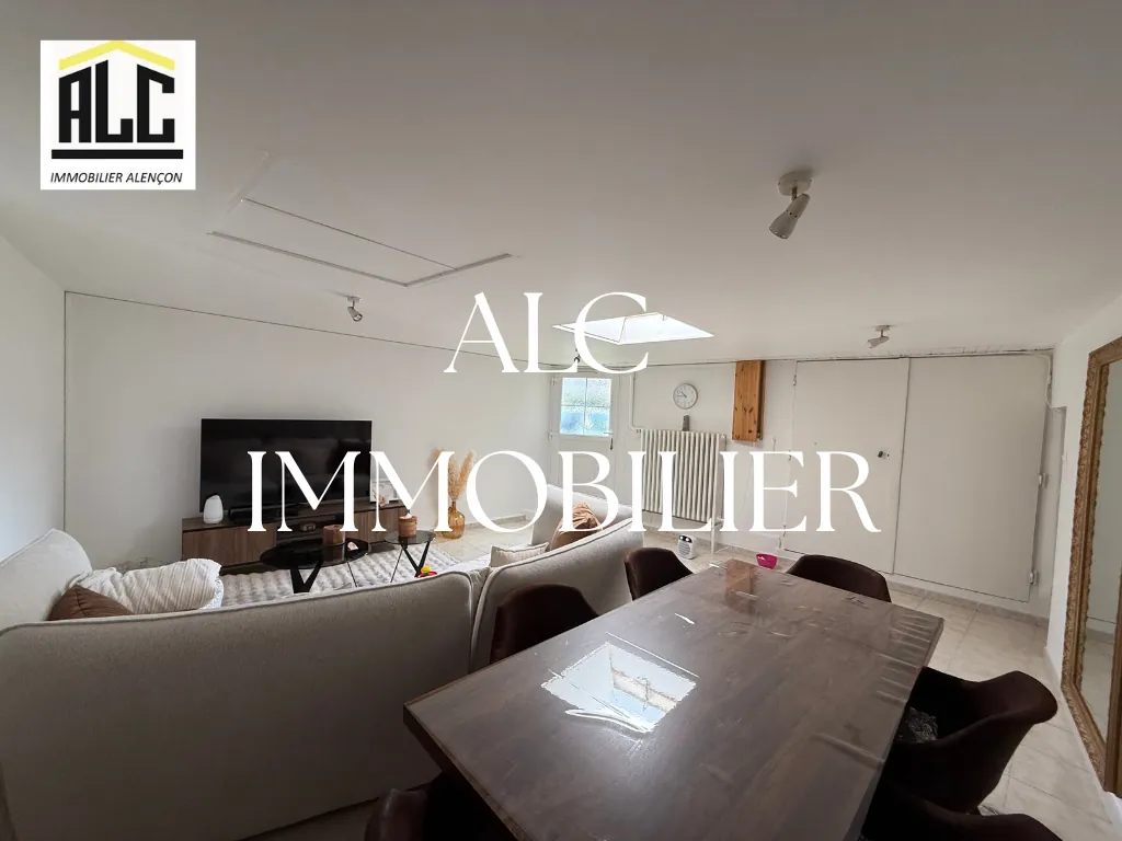 Maison à Damigny avec 3 chambres, garages et potentiel d'investissement locatif