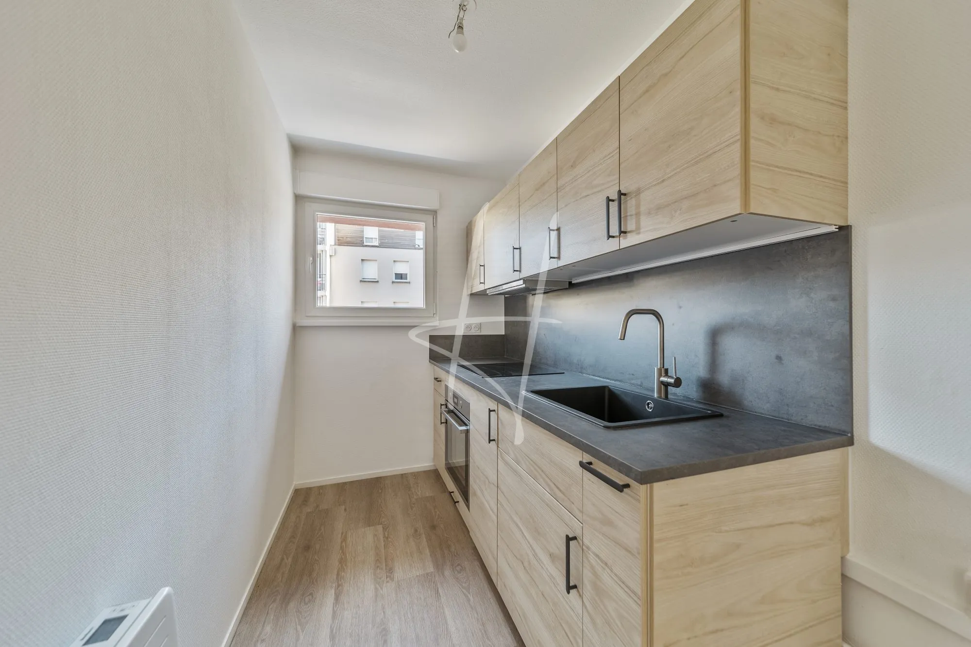 Appartement T2 rénové à Metz avec garage et vue dégagée 