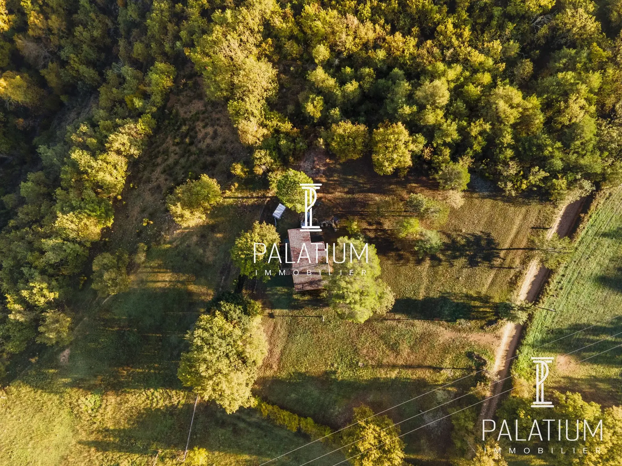Maison avec vue panoramique à Saint-Martin-de-Brôme, terrain arboré 