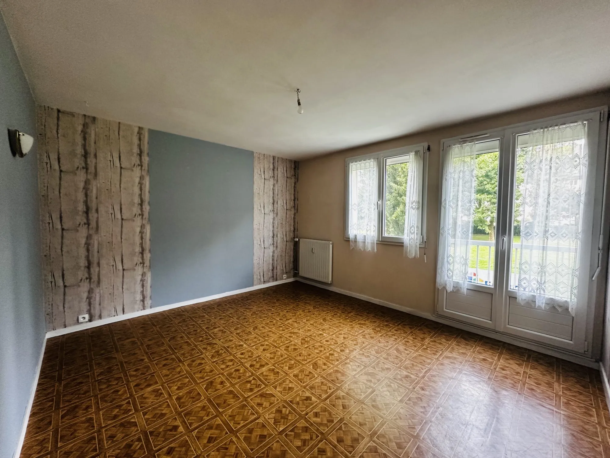 Appartement T3 à Rennes, 57 m², proche rue de Nantes, avec cave et parking