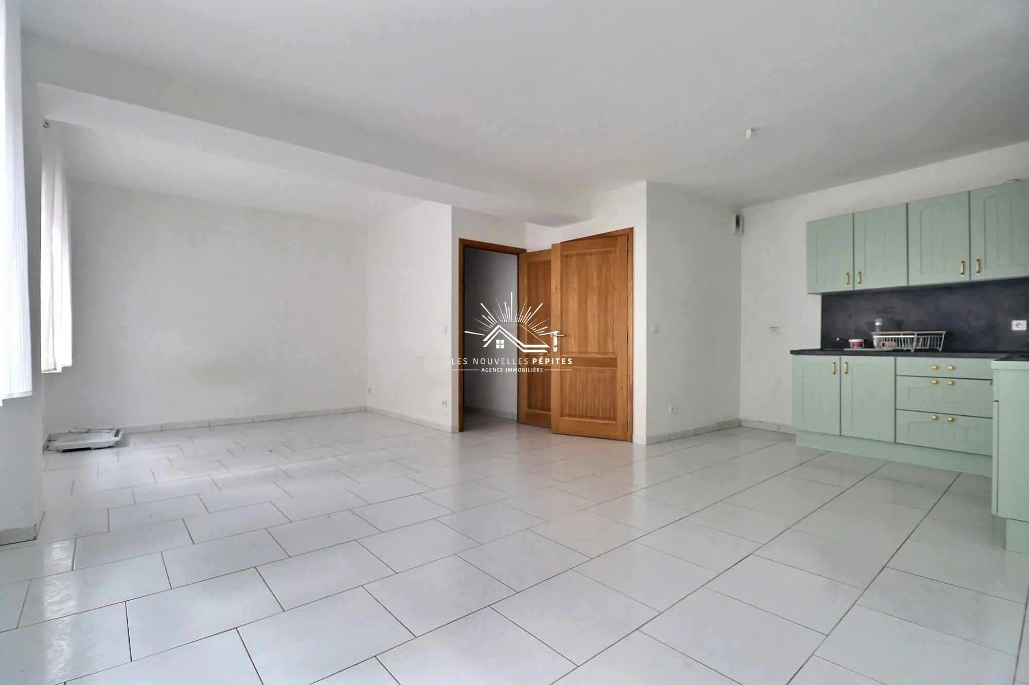 Appartement T3 en rez-de-chaussée avec extérieur à Croix - Investissement ou résidence 