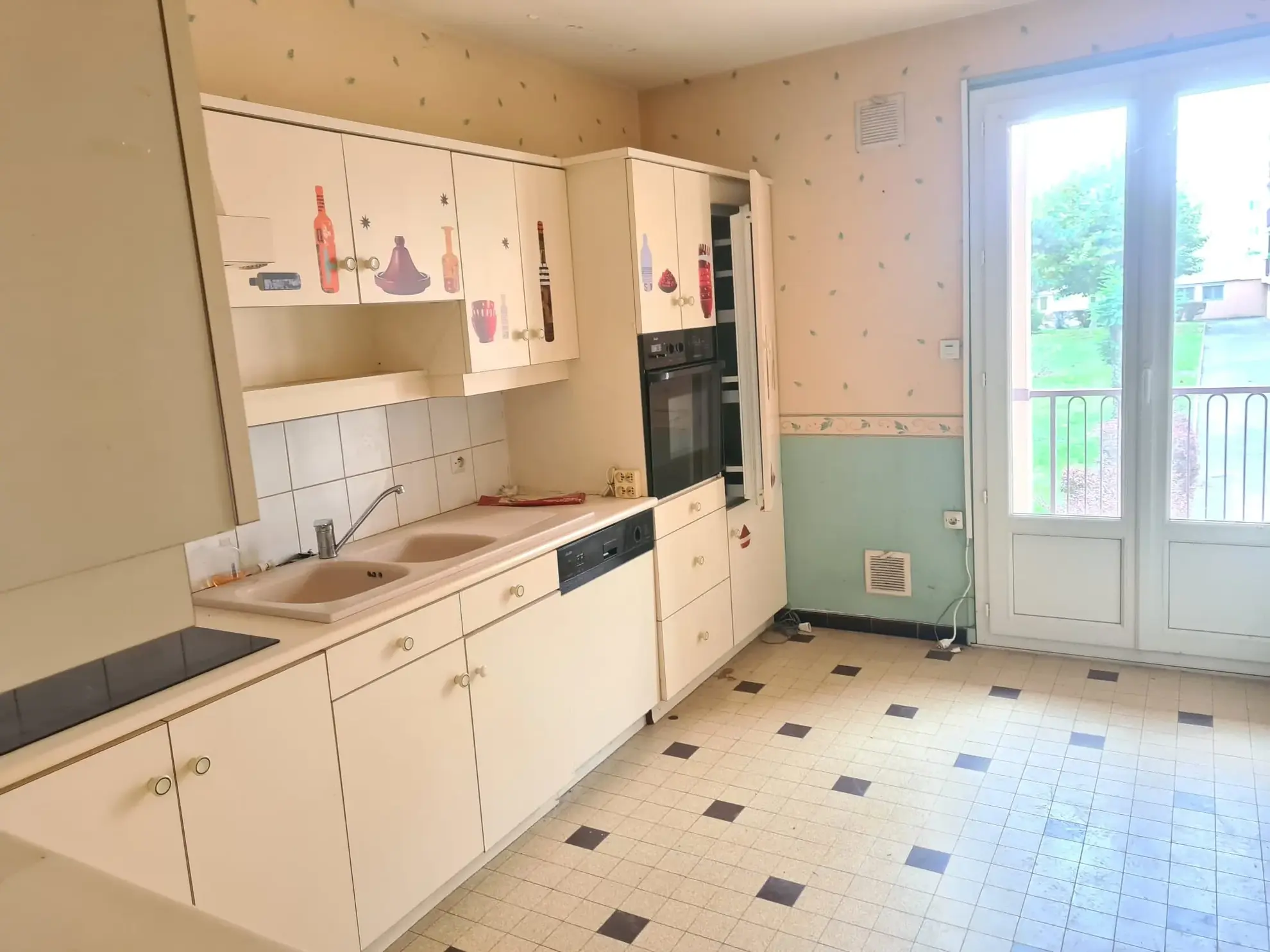 Appartement 4 pièces de 77 m² avec balcon, garage et cave à Guilherand-Granges 