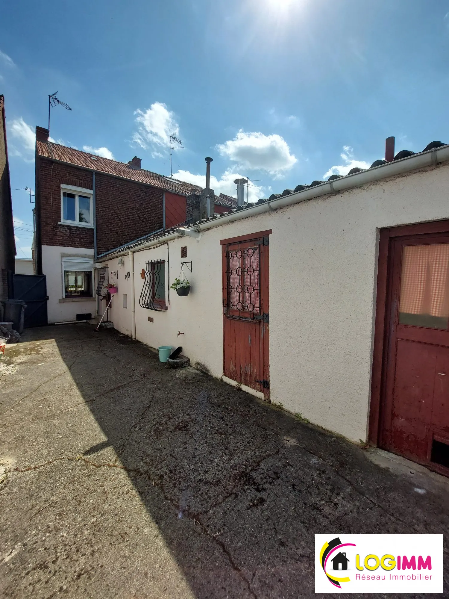 Charmante maison à Quievrechain avec jardin et fort potentiel à rénover