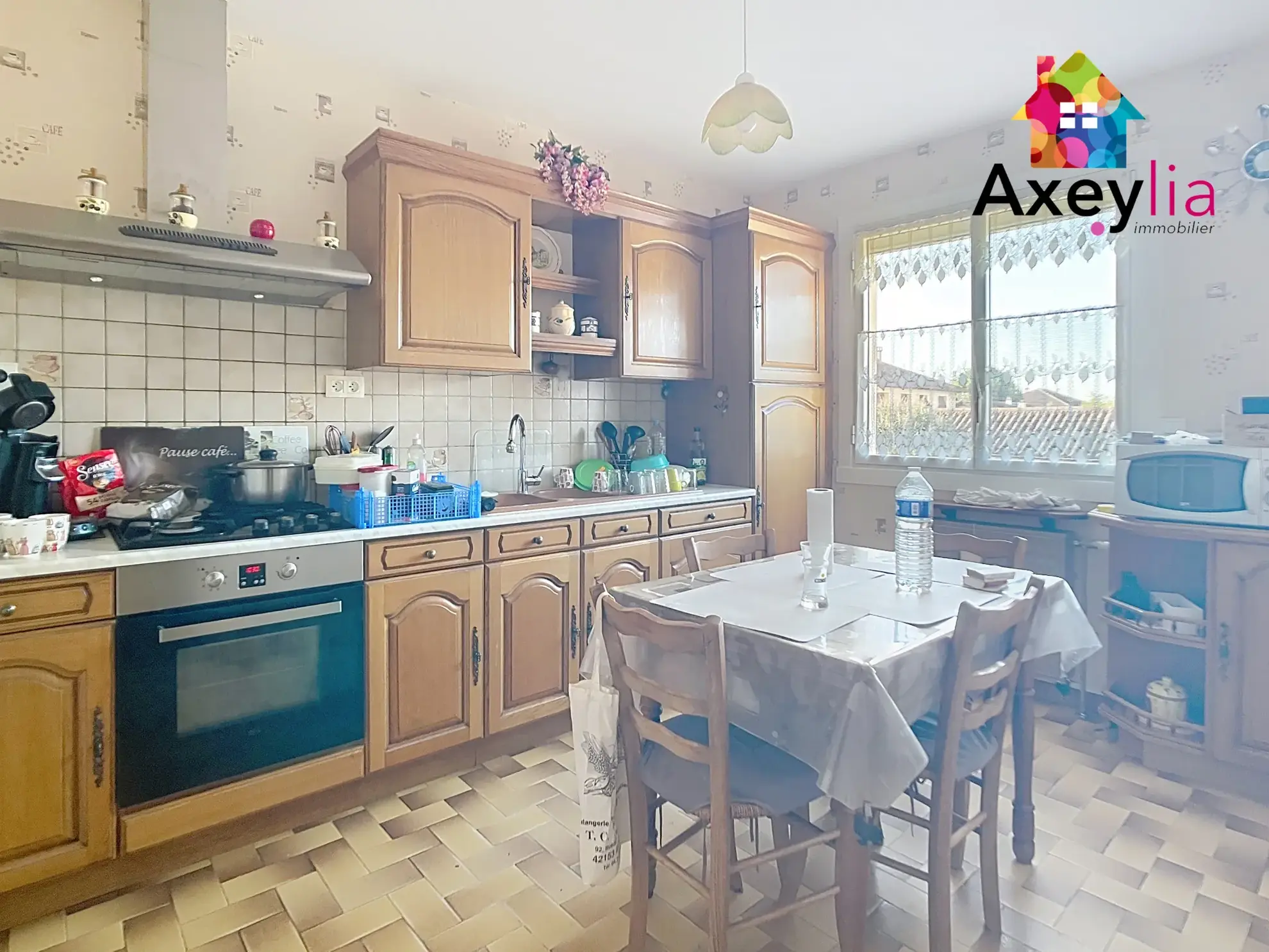 Maison à vendre à Mably avec 3 chambres, garages et terrasse - Secteur calme