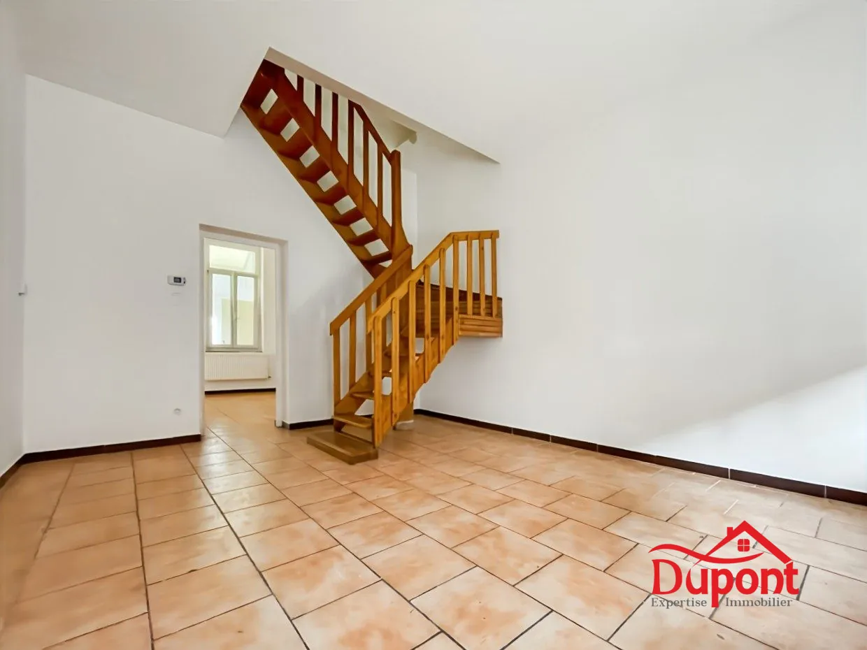 Maison mitoyenne 88 m² à Aniche avec potentiel de rénovation et cour privée