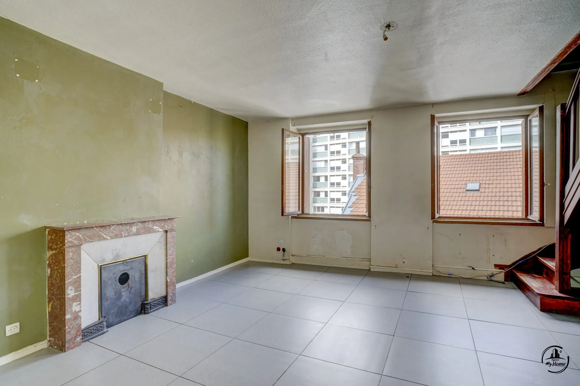 Duplex à rénover de 126 m² avec potentiel à Saint-Étienne, quartier Crêt de Roch 