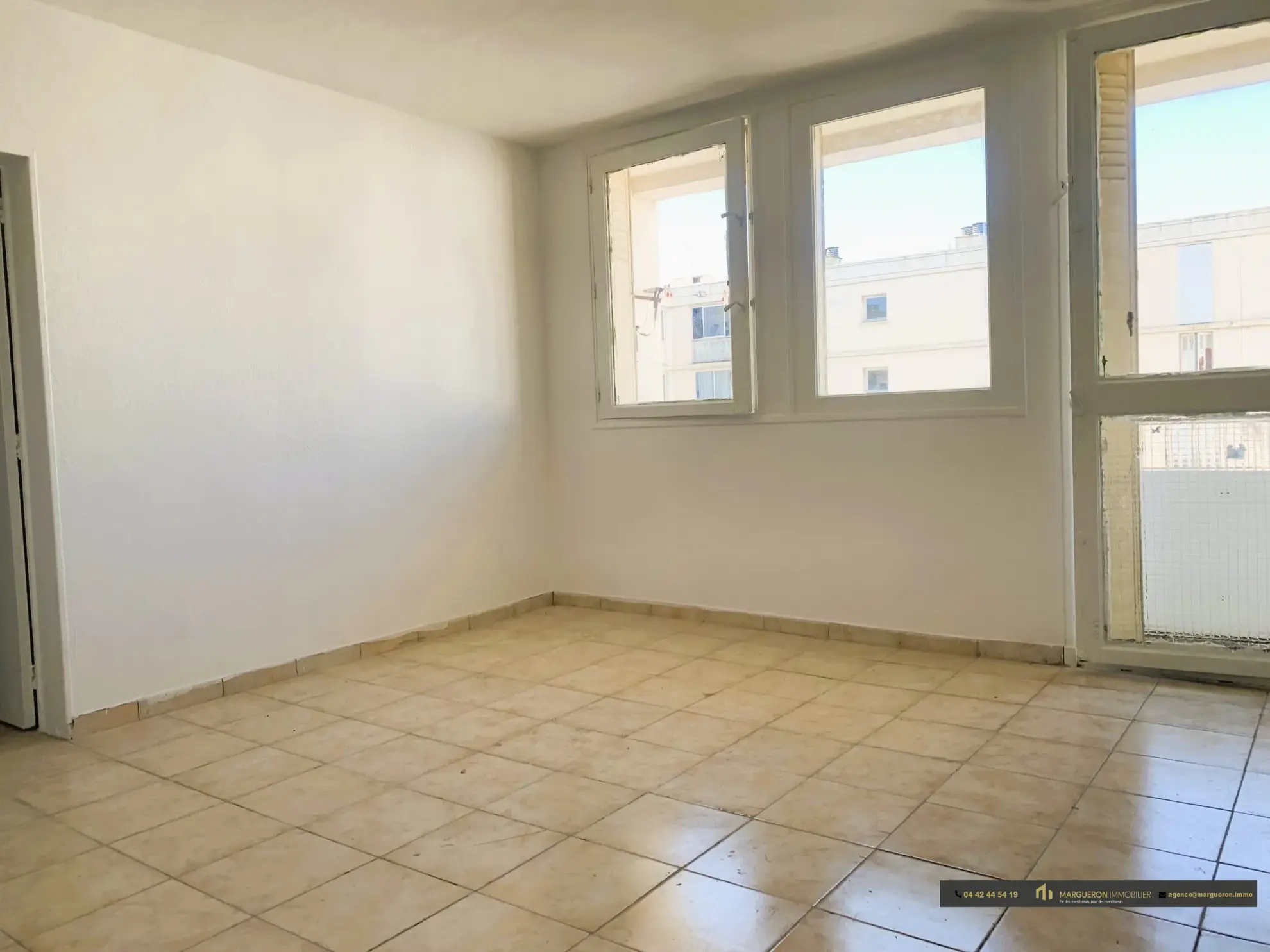 Appartement 3 pièces à vendre à Marignane avec balcon et cave 