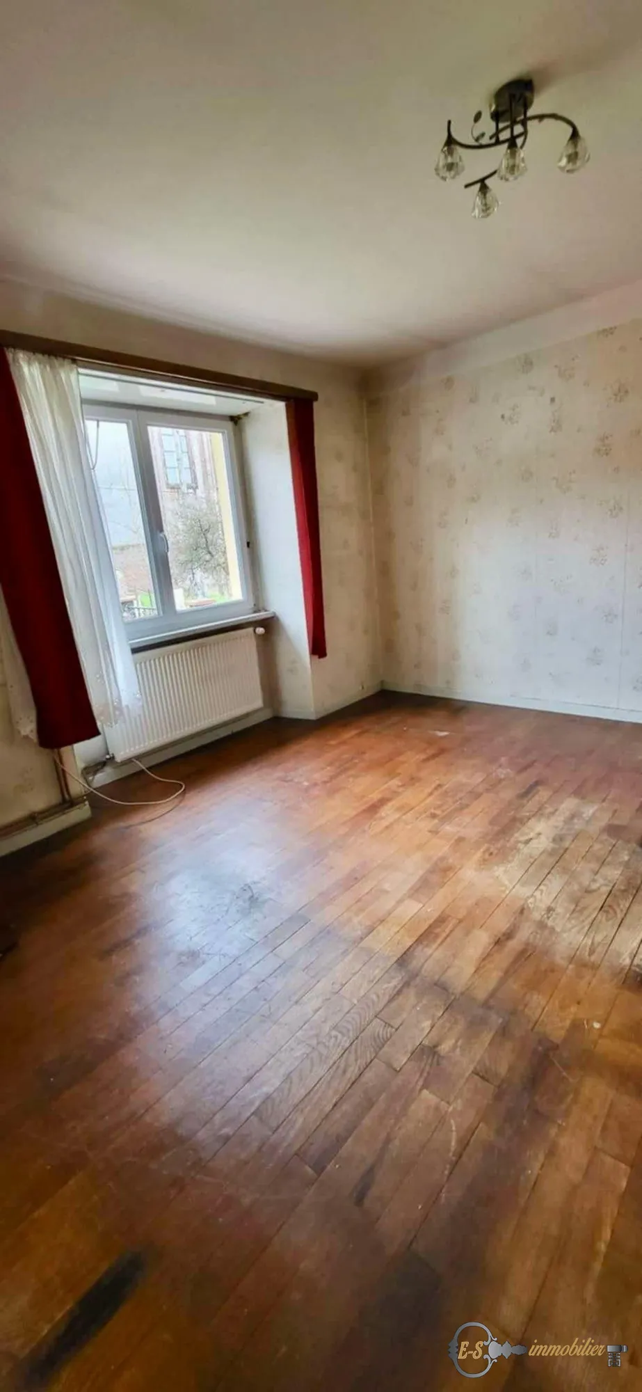 Maison mitoyenne à Lemberg à vendre – Opportunité à saisir avec garage et cave 