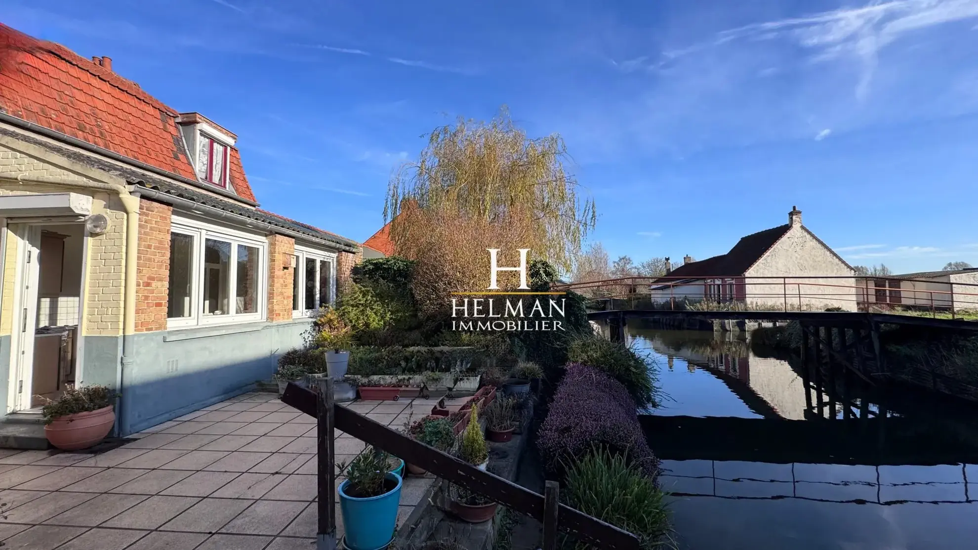 Maison mitoyenne de 131 m² avec accès au marais, garage et terrasse en vente à Saint-Omer