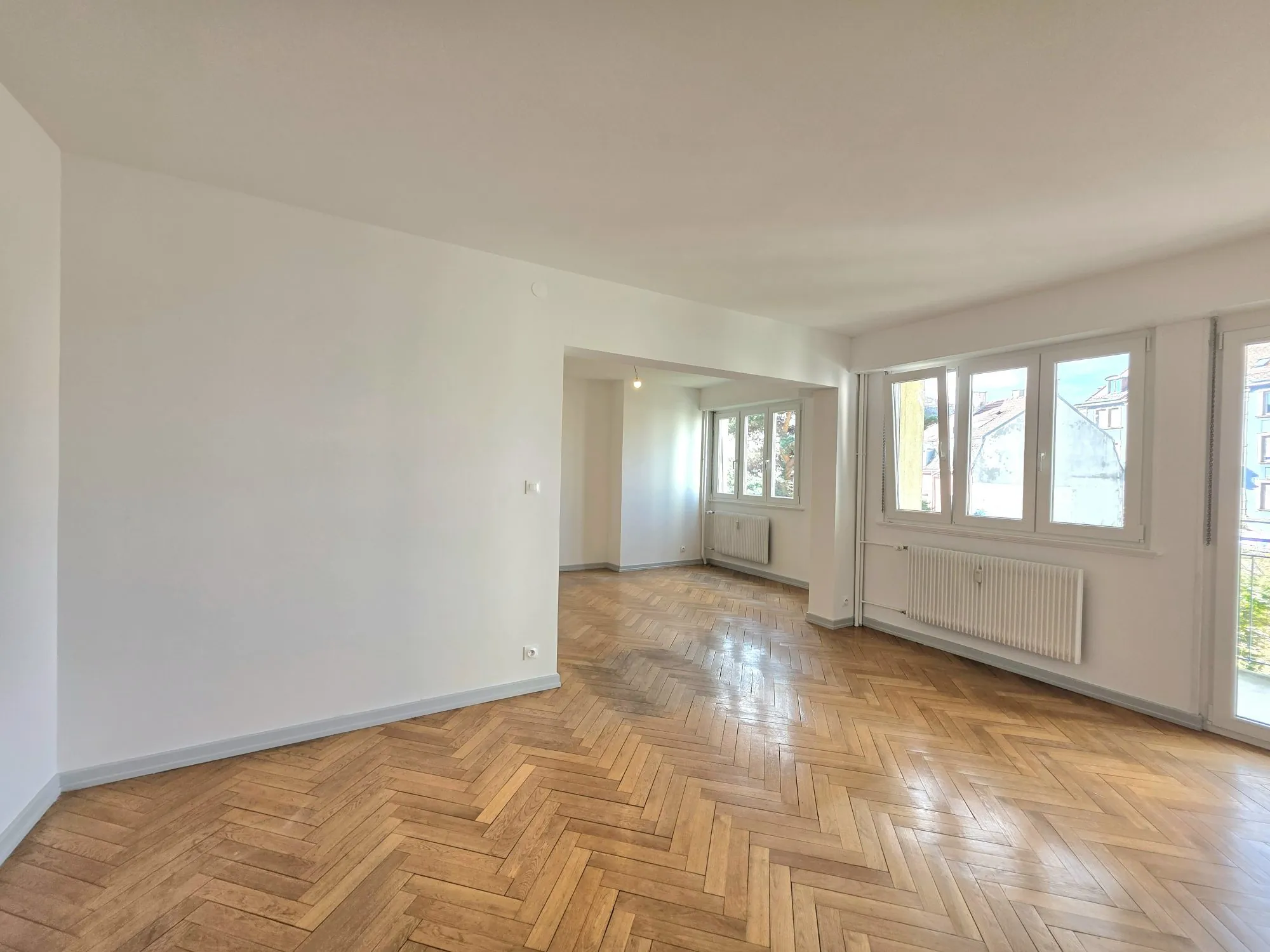 Bel appartement T3/T4 rénové à Mulhouse avec balcon et garage 