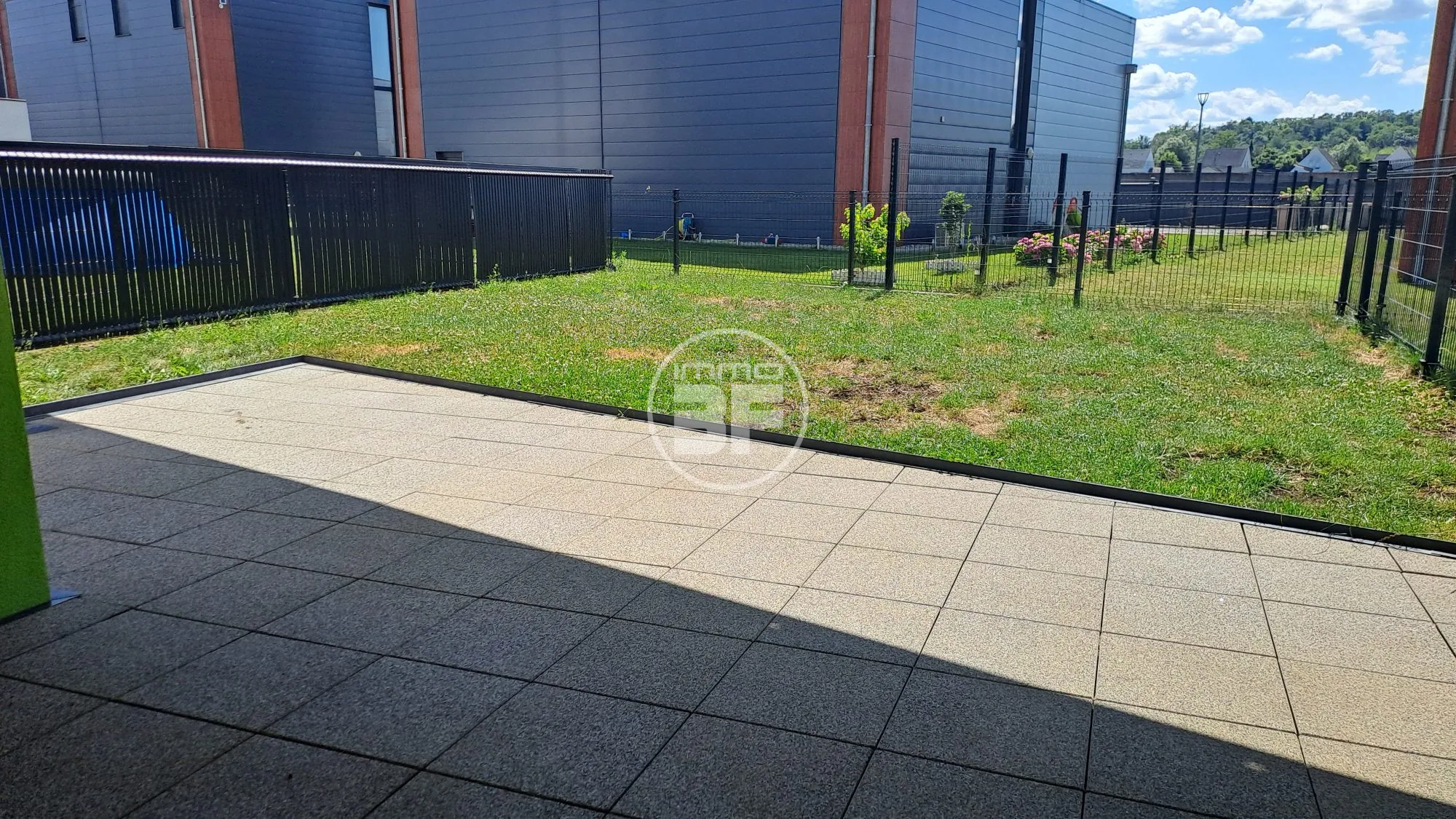 Appartement en rez-de-jardin avec terrasse et jardin privé à Blotzheim 