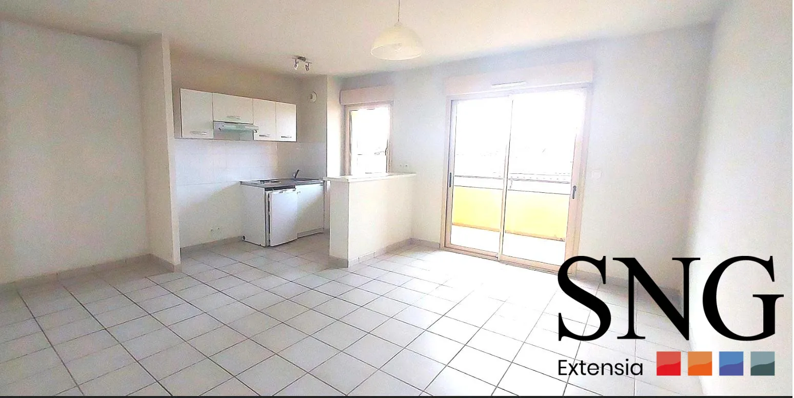 Appartement T3 à Albi avec balcon, deux parkings et proximité des commodités