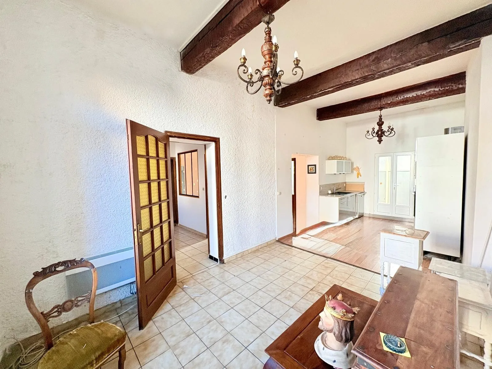 Ensemble immobilier à vendre au Soler avec 3 logements, jardin et potentiel de rénovation