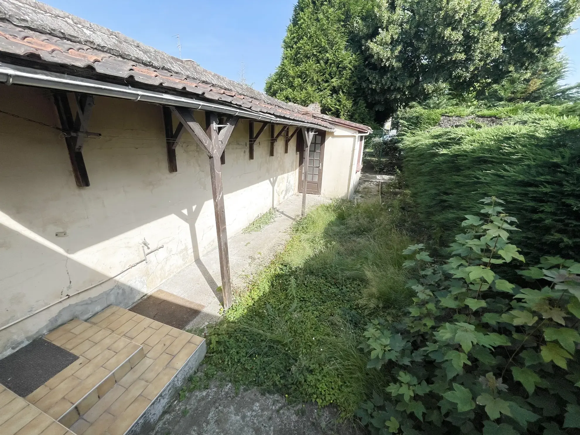 Maison de ville à vendre à Hénin Beaumont avec jardin et véranda