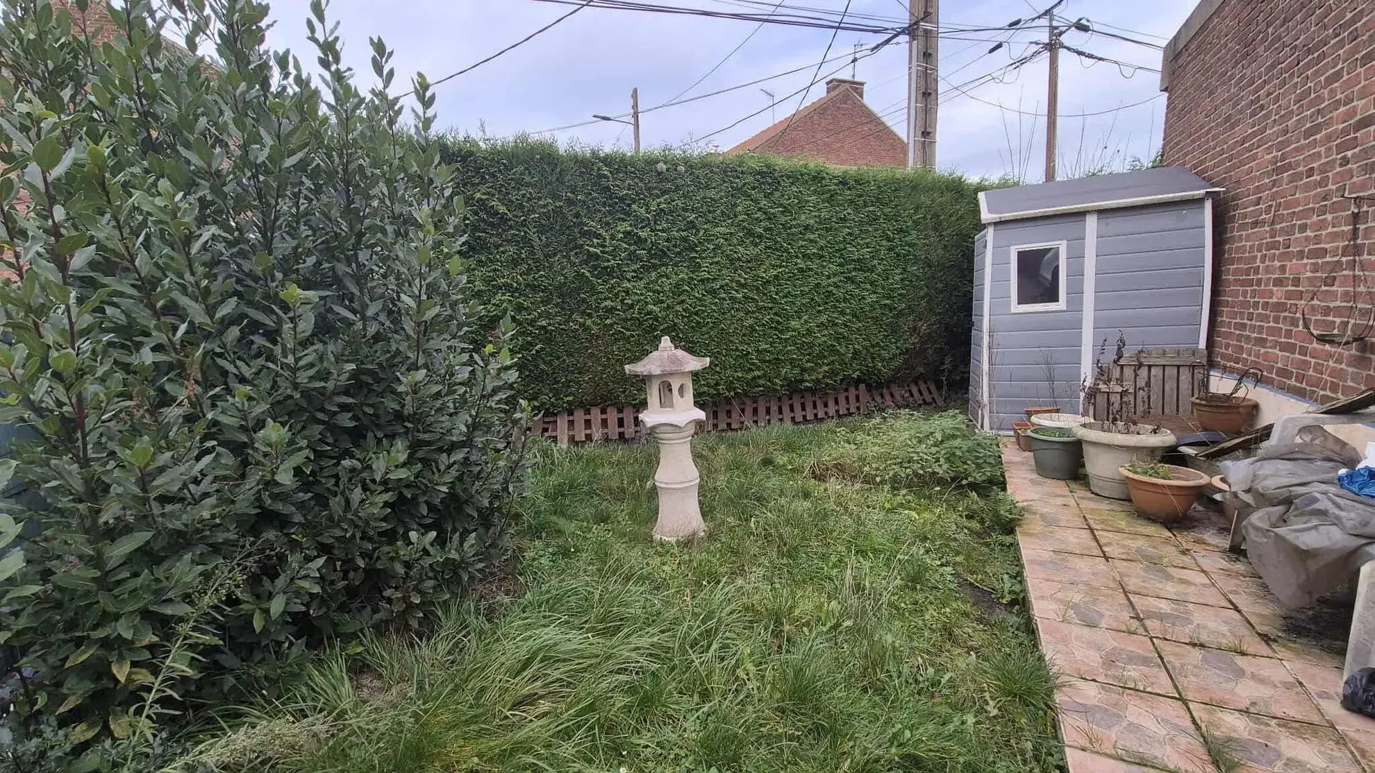 Maison à Harnes de 97 m² avec garage et jardin, à rénover 