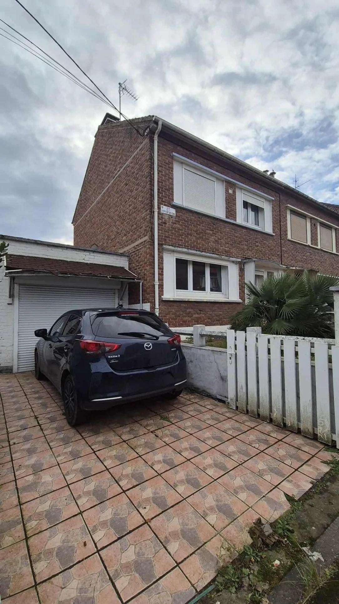Maison à Harnes de 97 m² avec garage et jardin, à rénover 