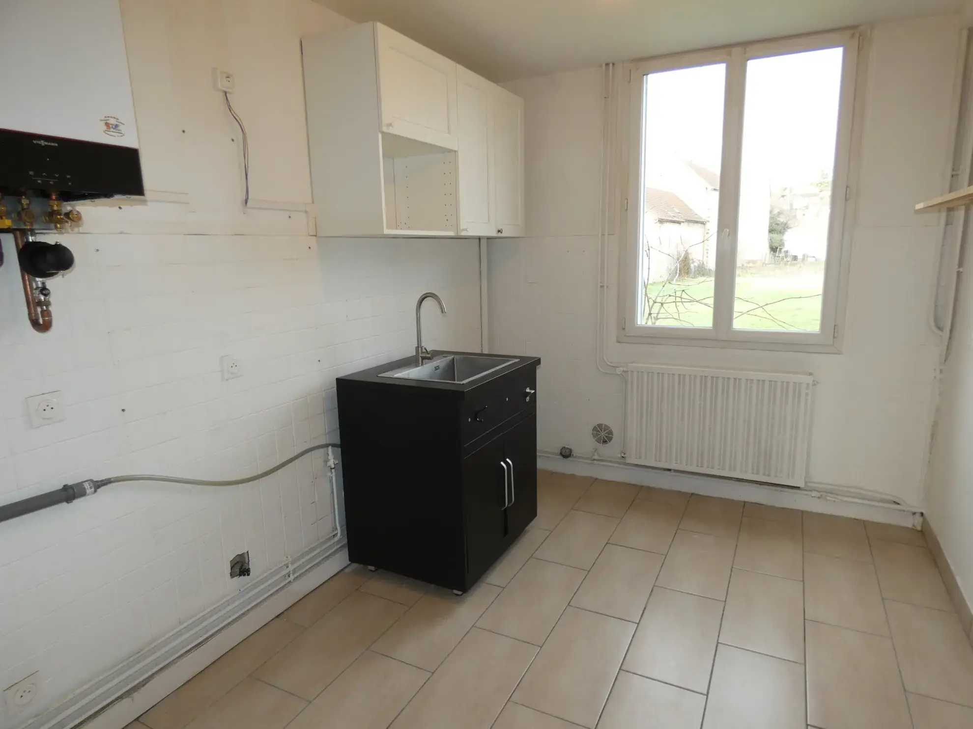 Appartement avec jardin privé à Migennes – idéal résidence ou investissement 