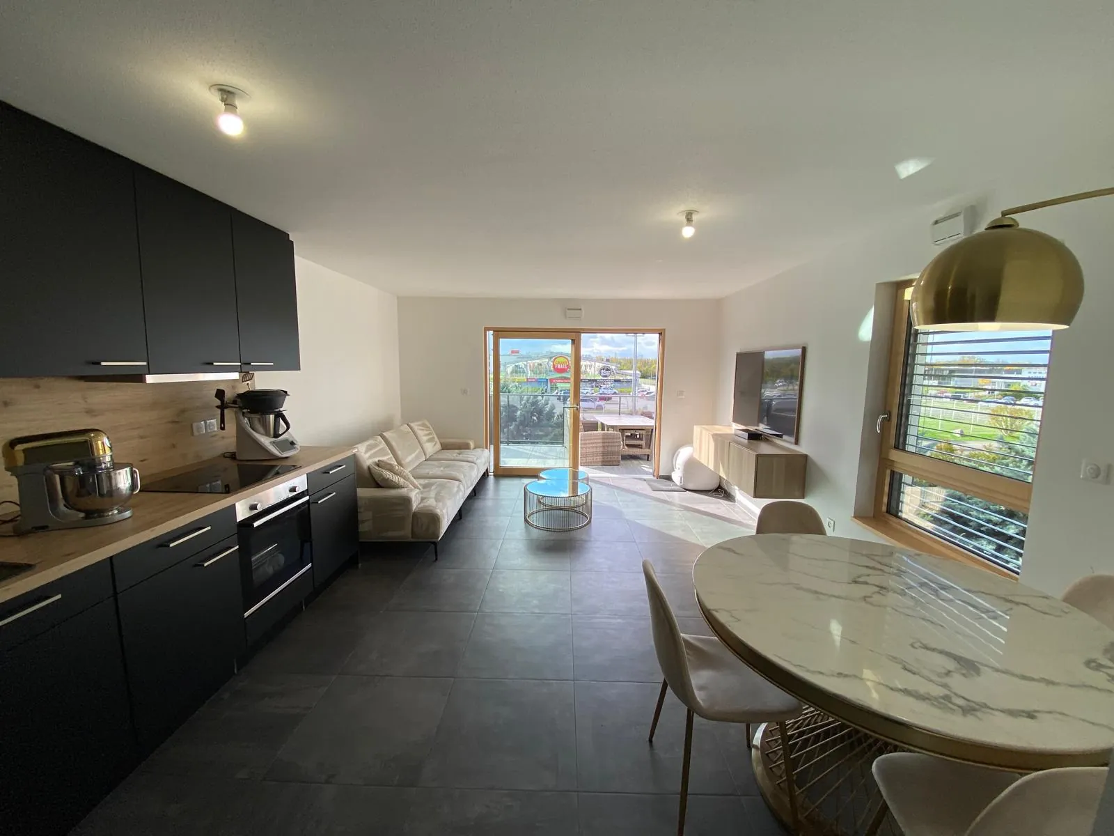 Appartement F3 à Saint-Louis de 64 m² avec terrasse, garage et cave 