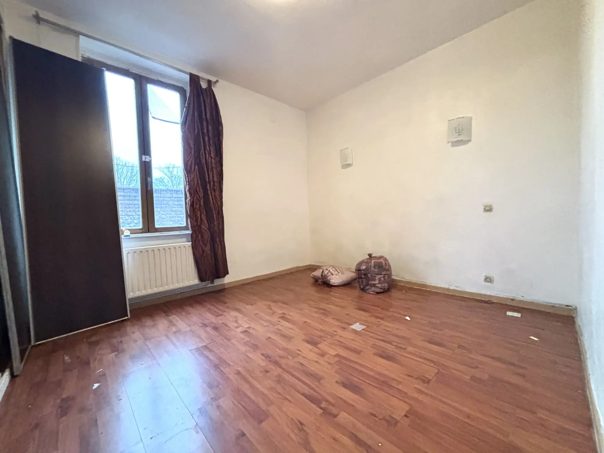 Maison de 95m² louée à Roubaix avec 4 chambres et rentabilité de 10% 