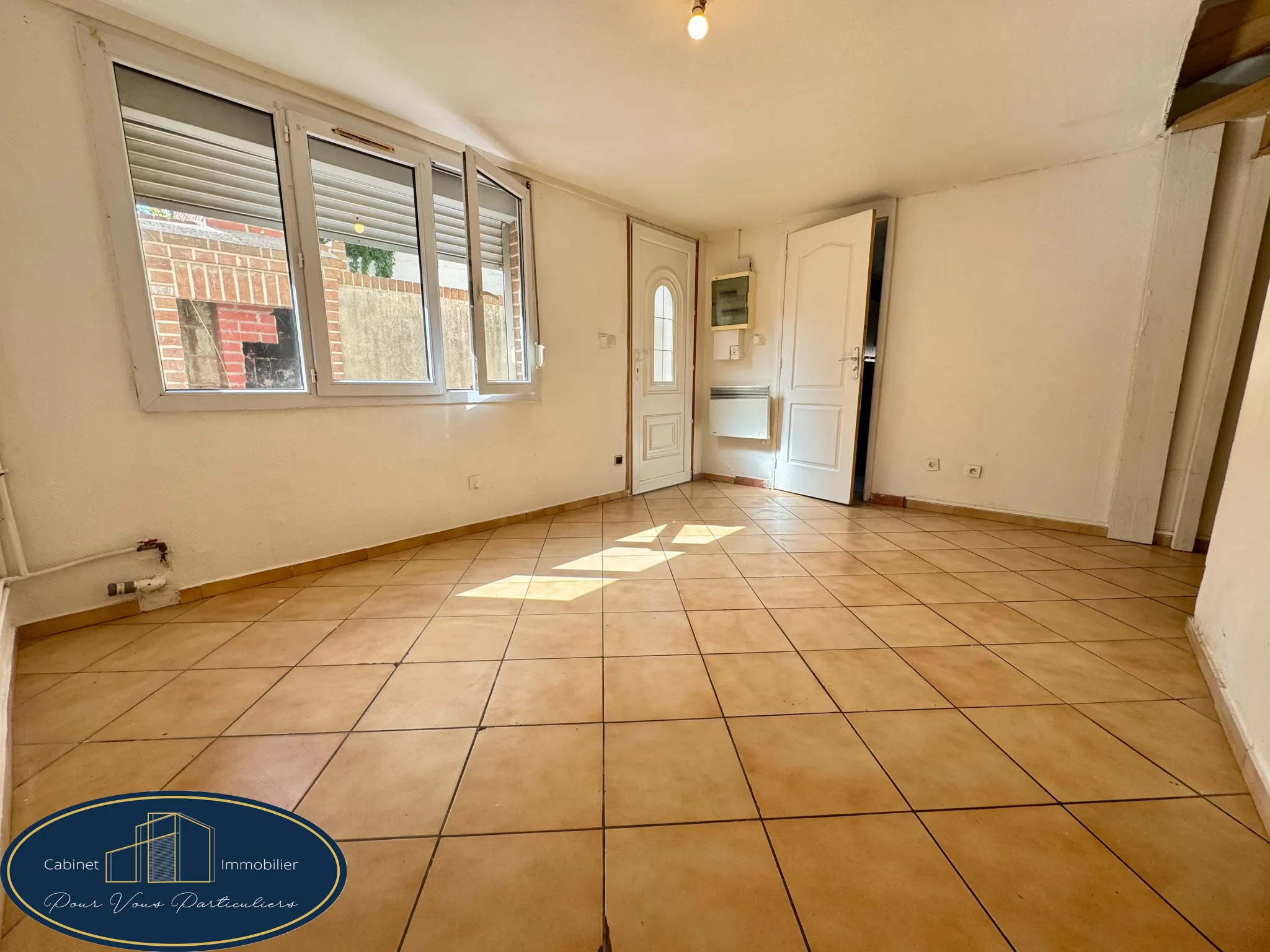 Maison semi-individuelle à Denain de 46m² avec 2 chambres et cour