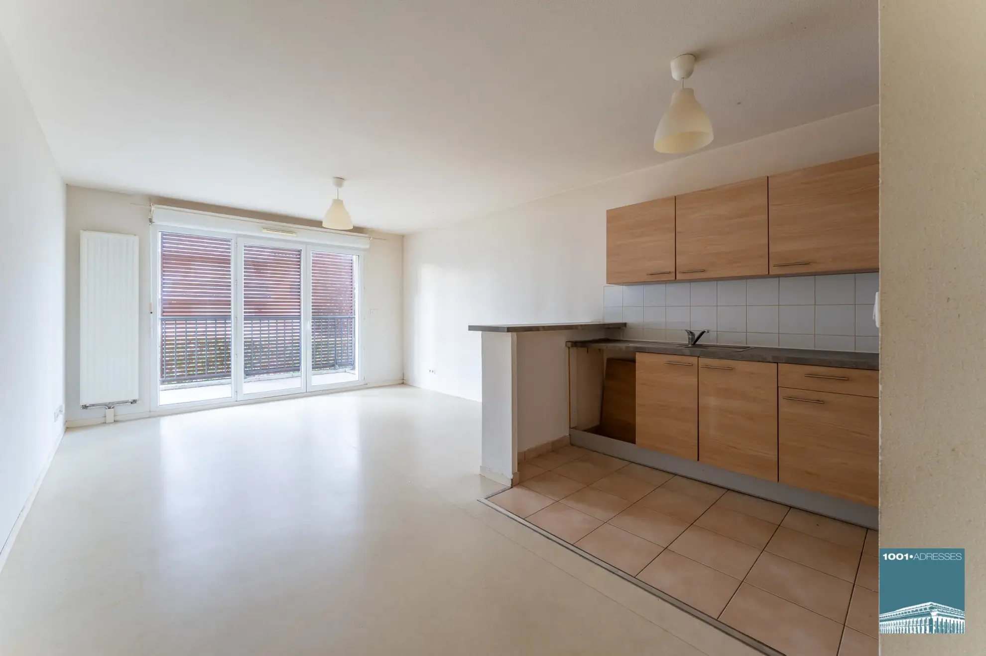 Appartement 4 pièces avec balcon et stationnement à Bassens 