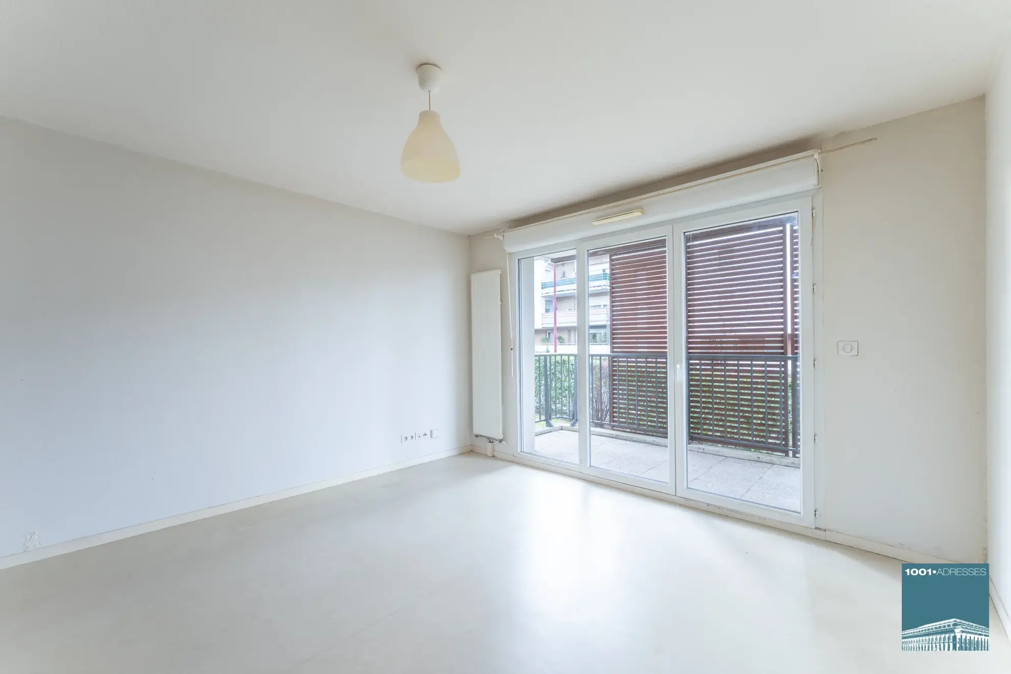 Appartement 4 pièces avec balcon et stationnement à Bassens 