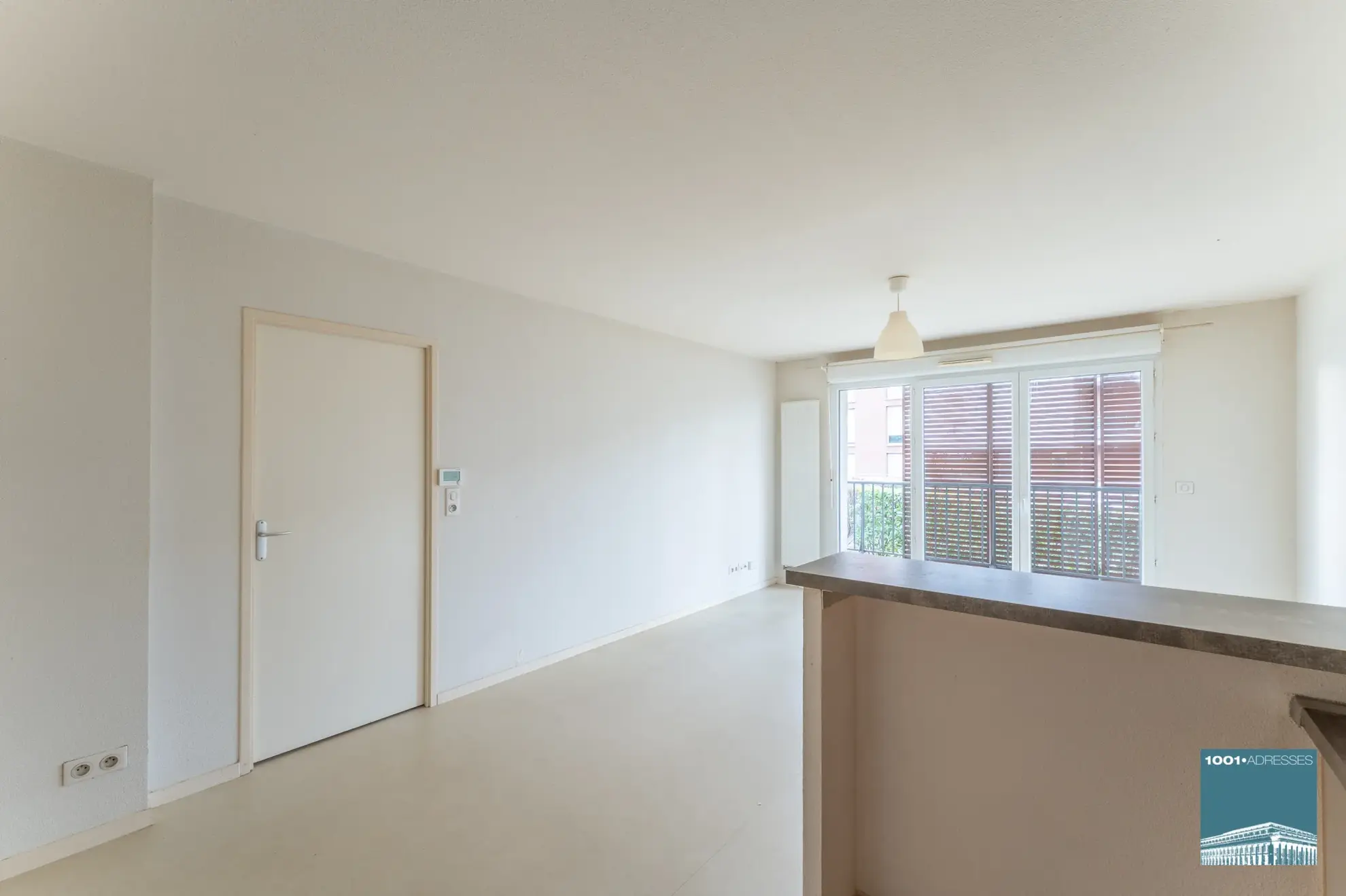 Appartement 4 pièces avec balcon et stationnement à Bassens 