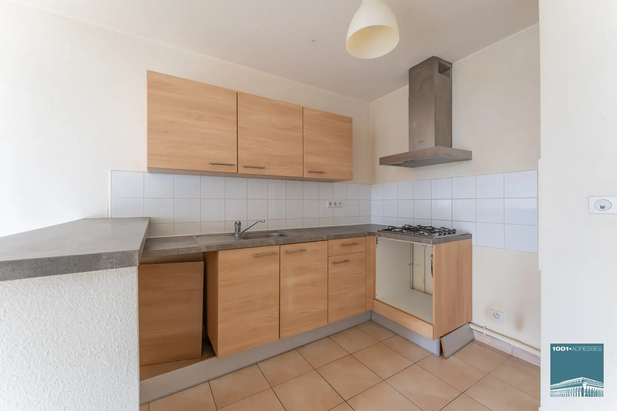 Appartement 4 pièces avec balcon et stationnement à Bassens 