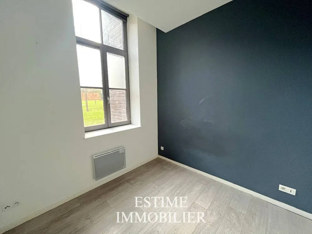 Appartement T2 à Roubaix avec parking, sécurité et vue sur parc 