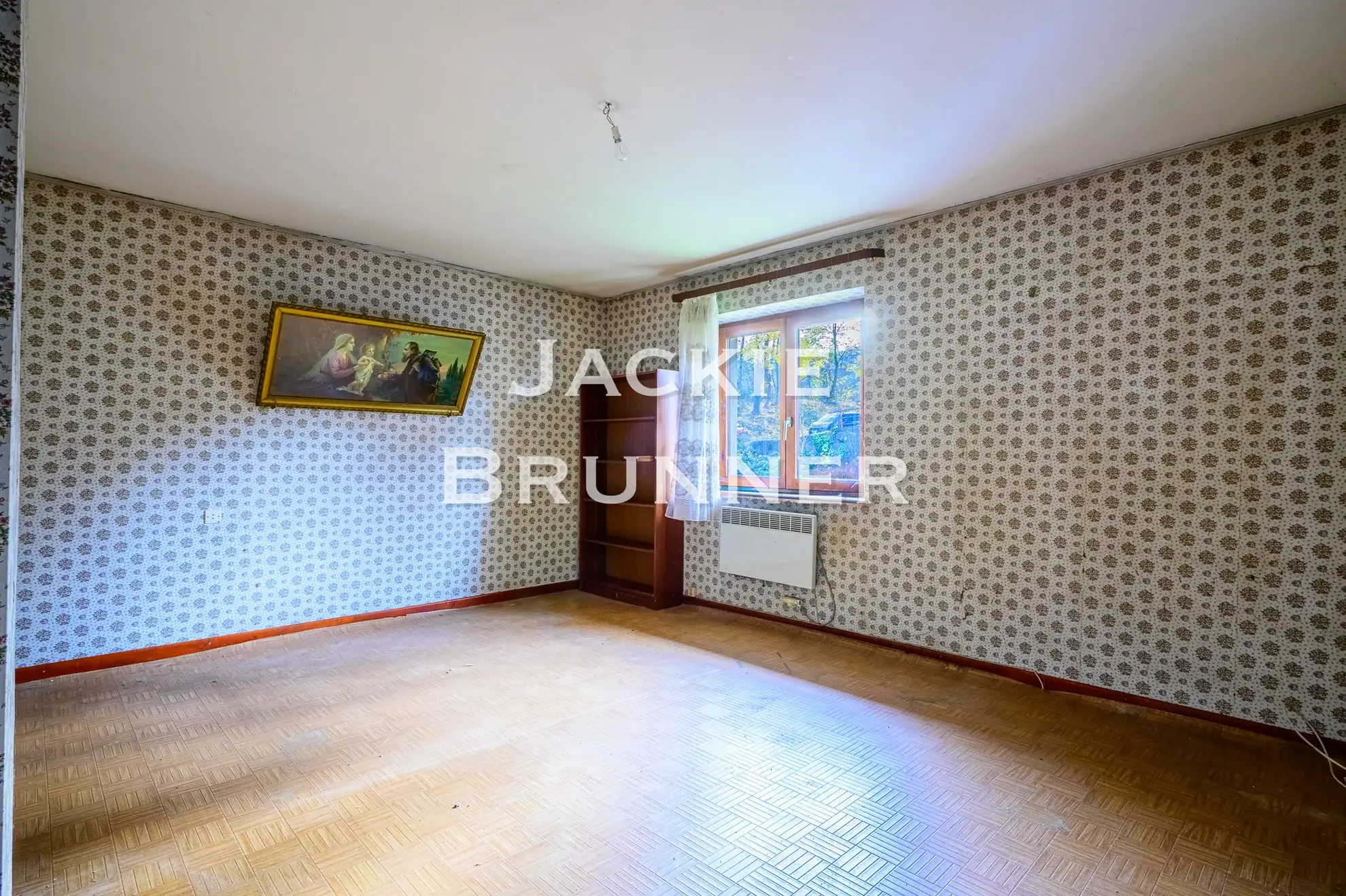 Maison individuelle à Saint-Amarin Hautesurs à rénover avec jardin et garage 