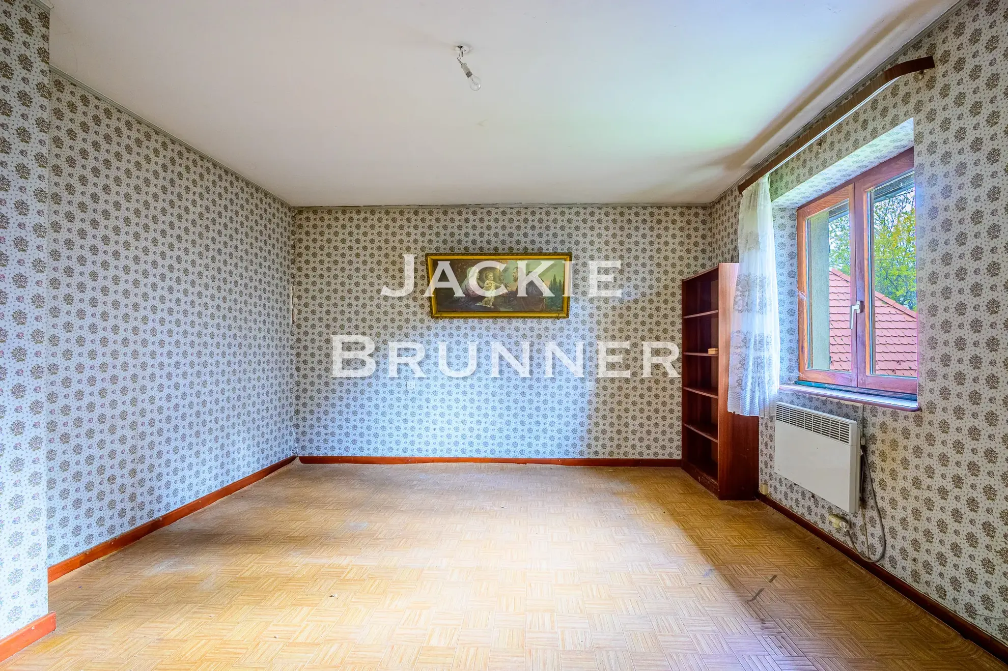 Maison individuelle à Saint-Amarin Hautesurs à rénover avec jardin et garage 