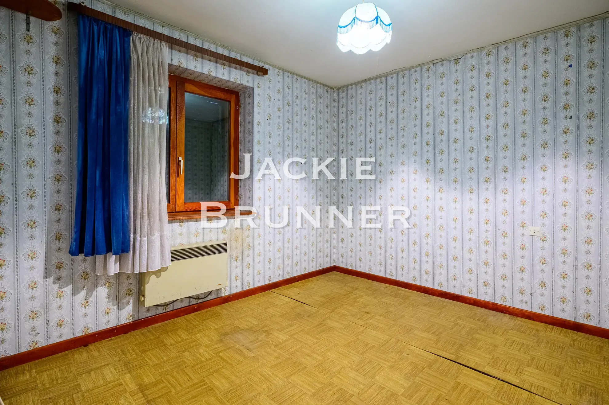 Maison individuelle à Saint-Amarin Hautesurs à rénover avec jardin et garage 