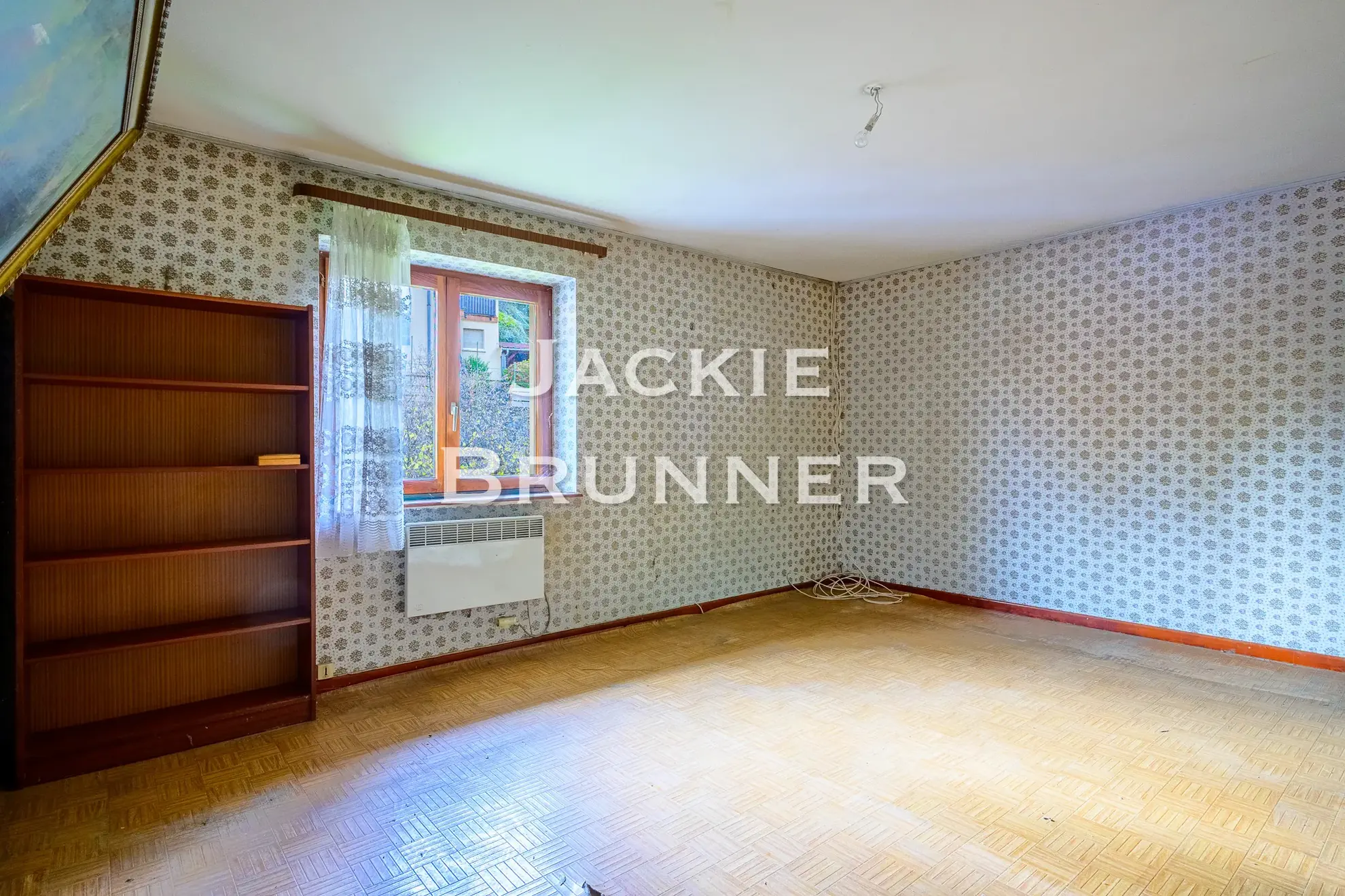 Maison individuelle à Saint-Amarin Hautesurs à rénover avec jardin et garage 