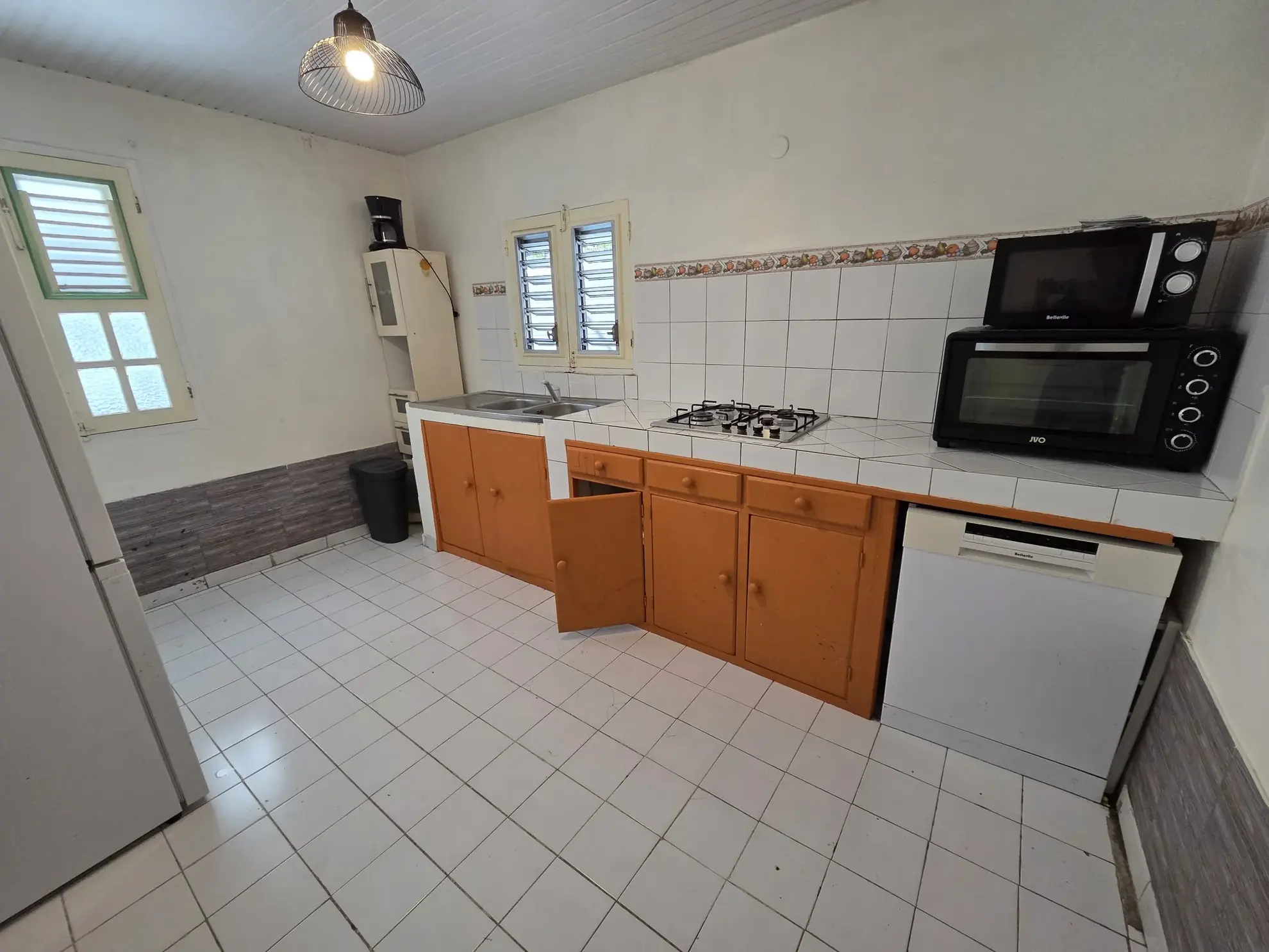 Maison T3 à Petit-Bourg avec terrasse, idéale pour habitation ou activité professionnelle 