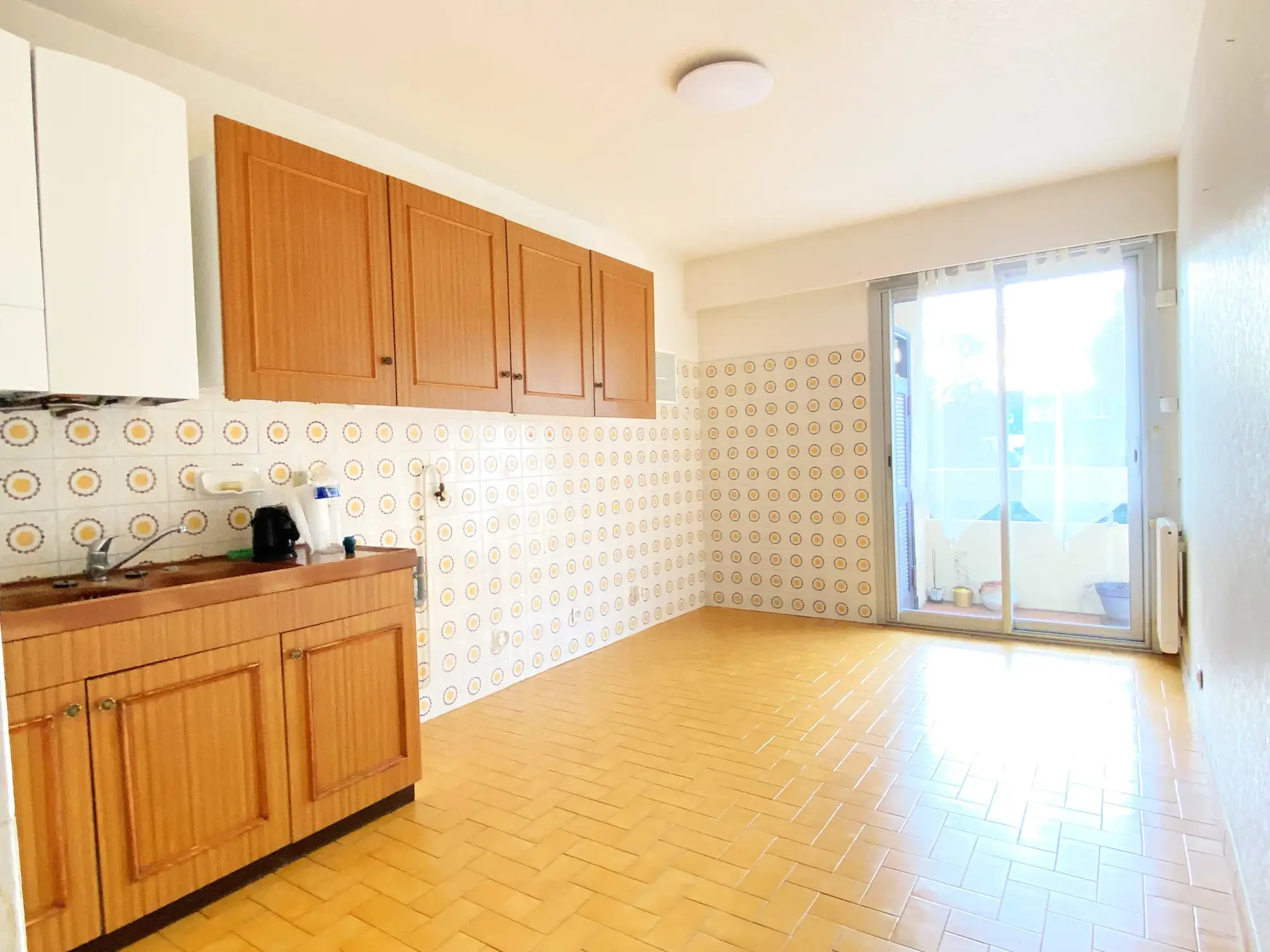 A vendre appartement traversant avec terrasse et garage à Perpignan Sud 