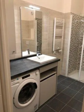 Appartement 2 pièces avec balcon à Fleury-sur-Orne, résidence seniors près du tramway 