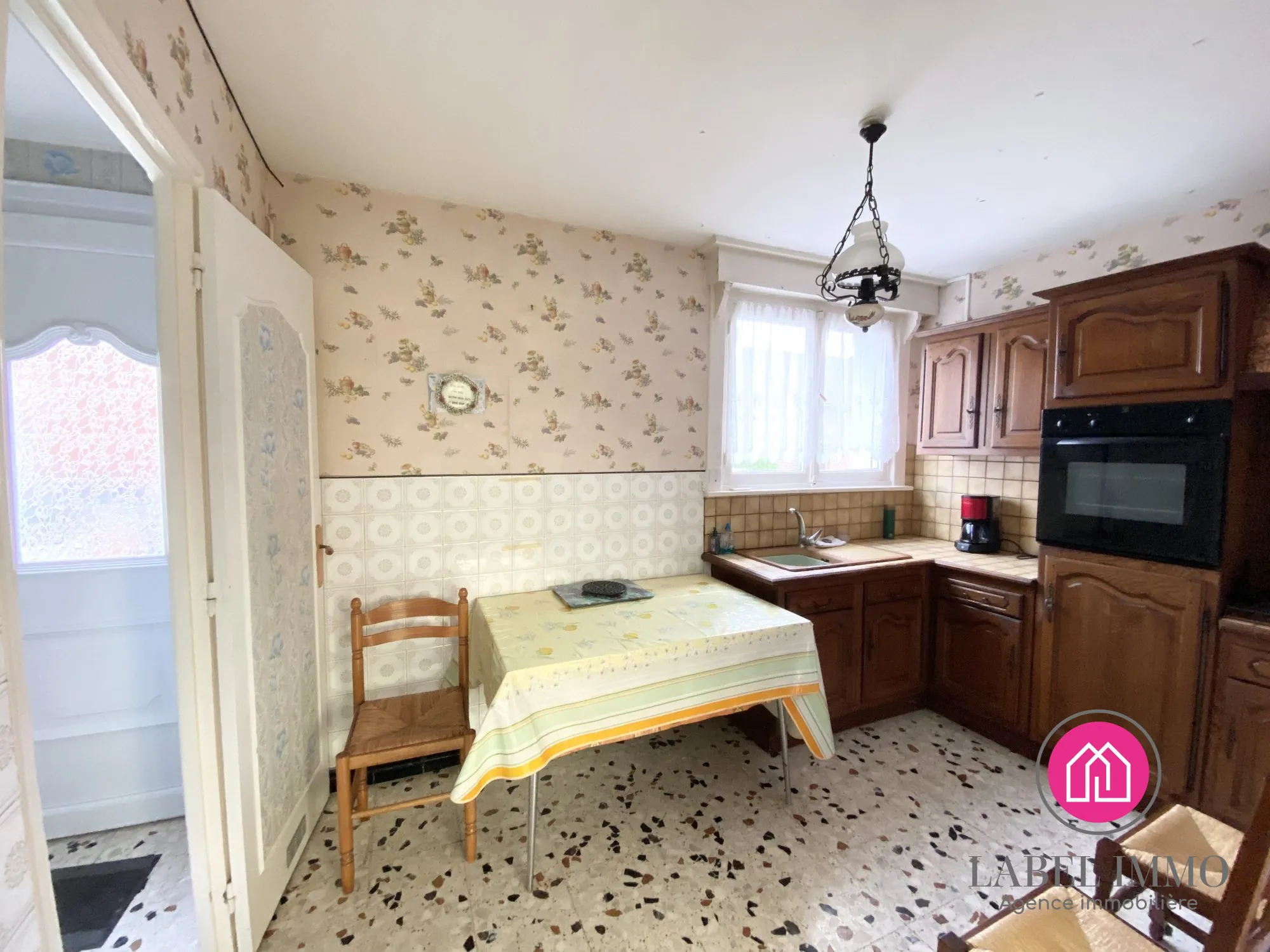 Maison à rénover à Marquette-en-Ostrevant avec jardin et dépendance 