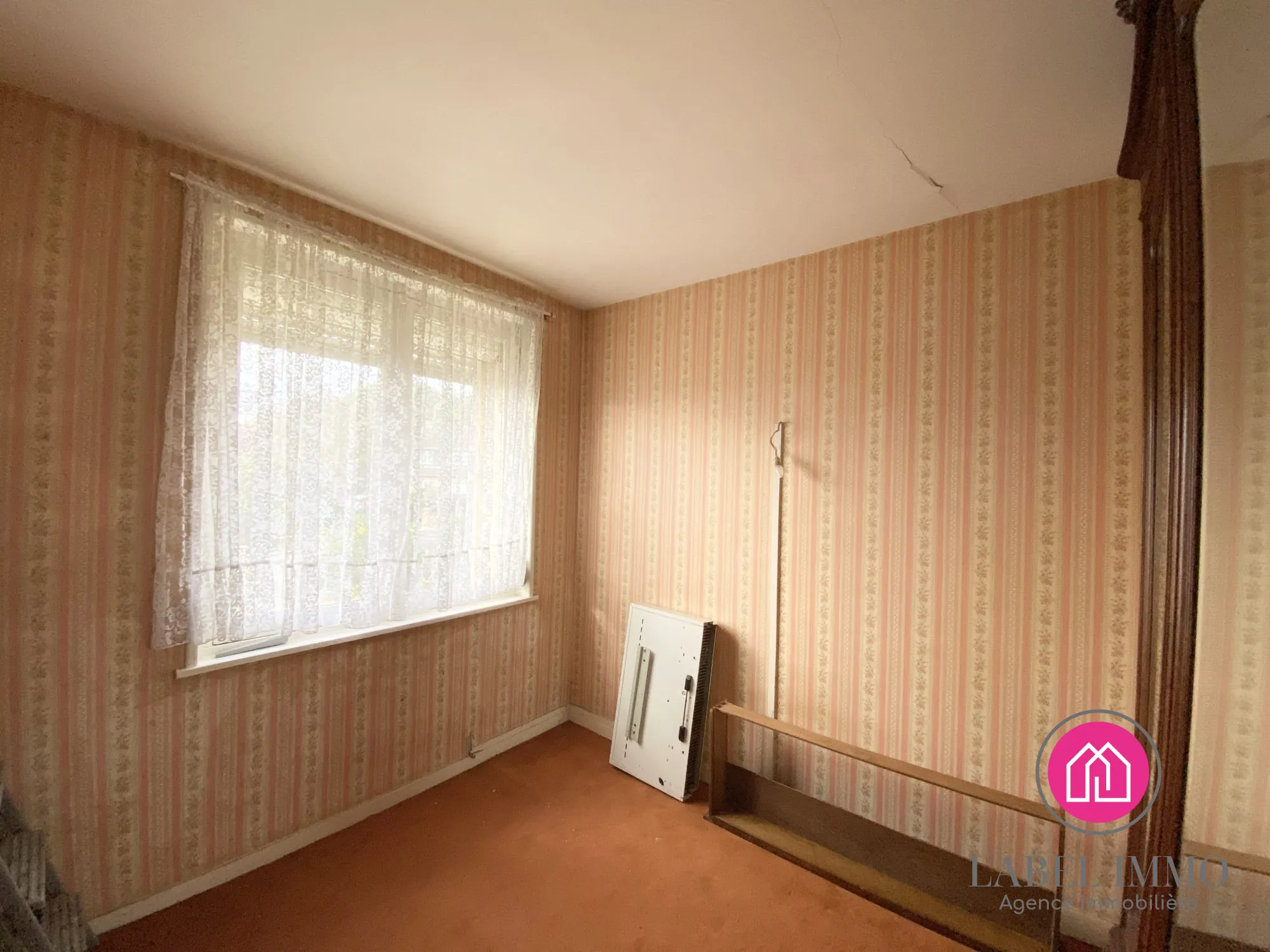 Maison à rénover à Marquette-en-Ostrevant avec jardin et dépendance 