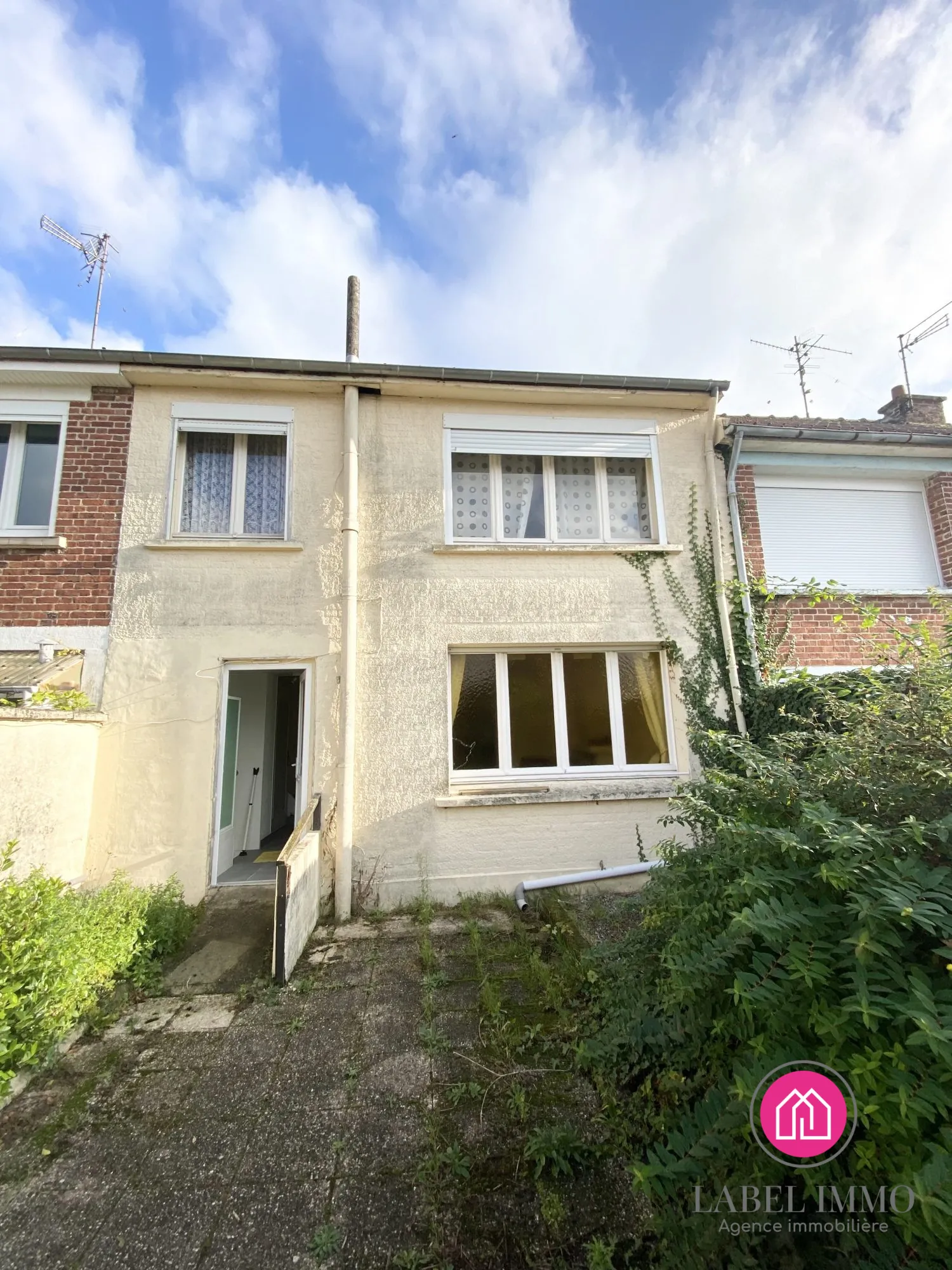 Maison à rénover à Marquette-en-Ostrevant avec jardin et dépendance 