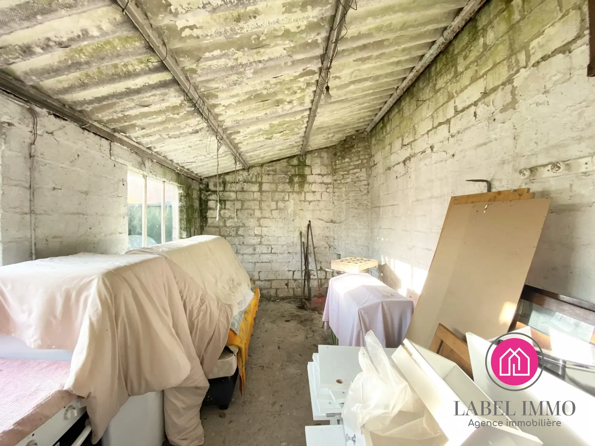 Maison à rénover à Marquette-en-Ostrevant avec jardin et dépendance 