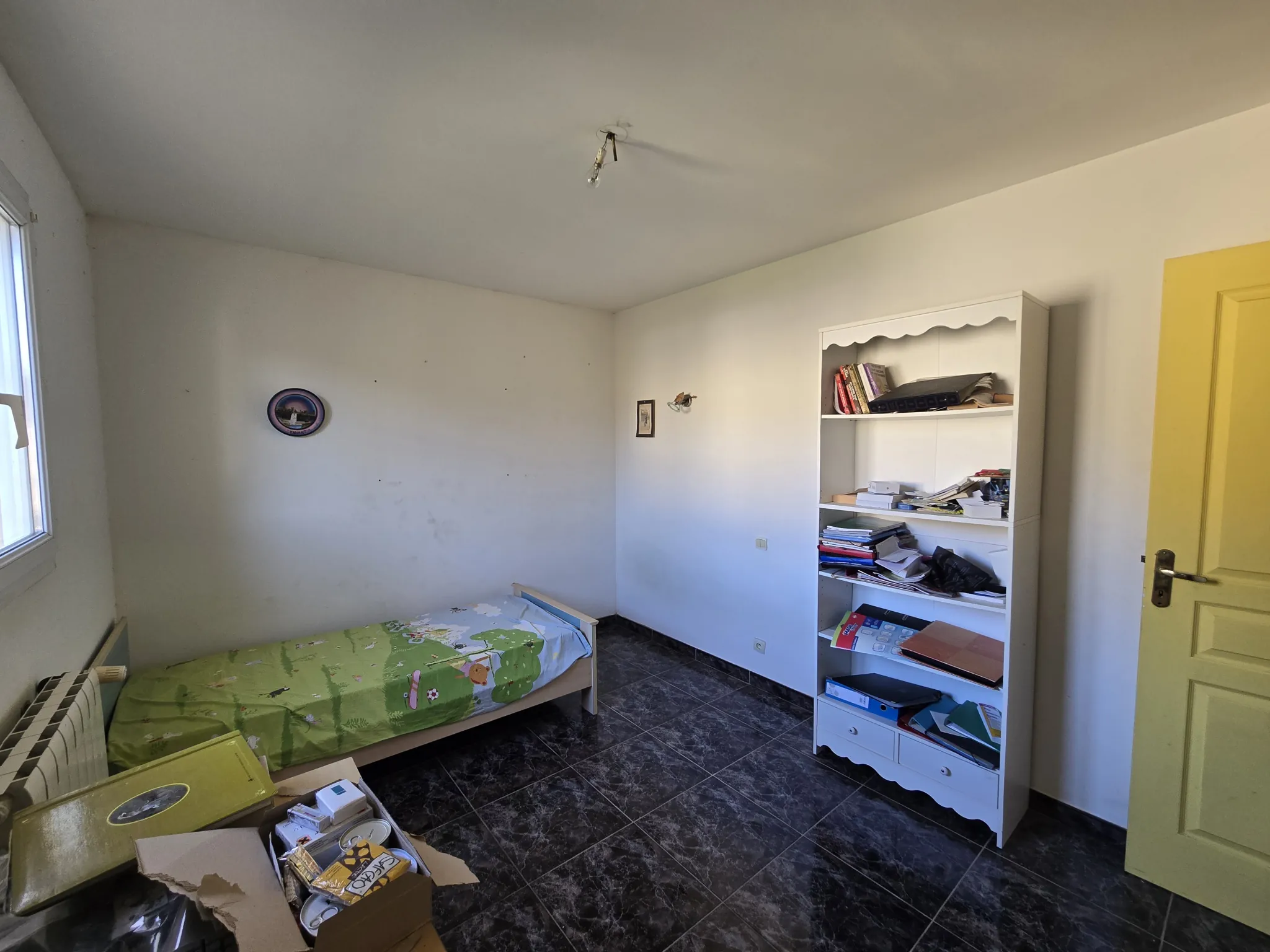 Maison de 140 m² à Lodève avec terrain constructible et potentiel de rénovation 