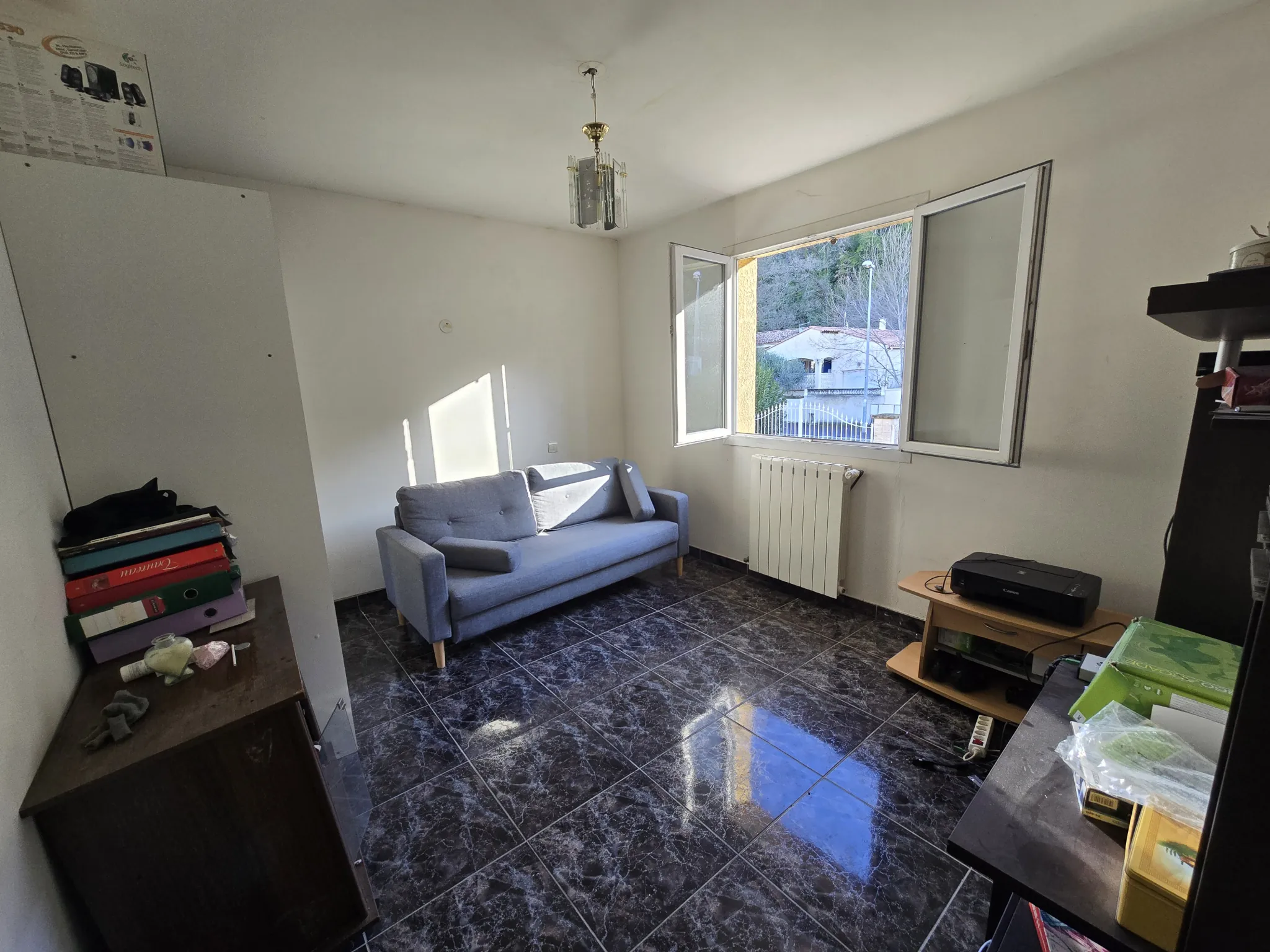 Maison de 140 m² à Lodève avec terrain constructible et potentiel de rénovation 