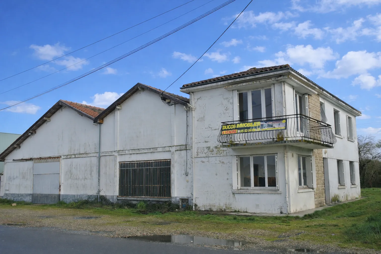 Immeuble de rapport à Marmande avec grand hangar et potentiel de valorisation