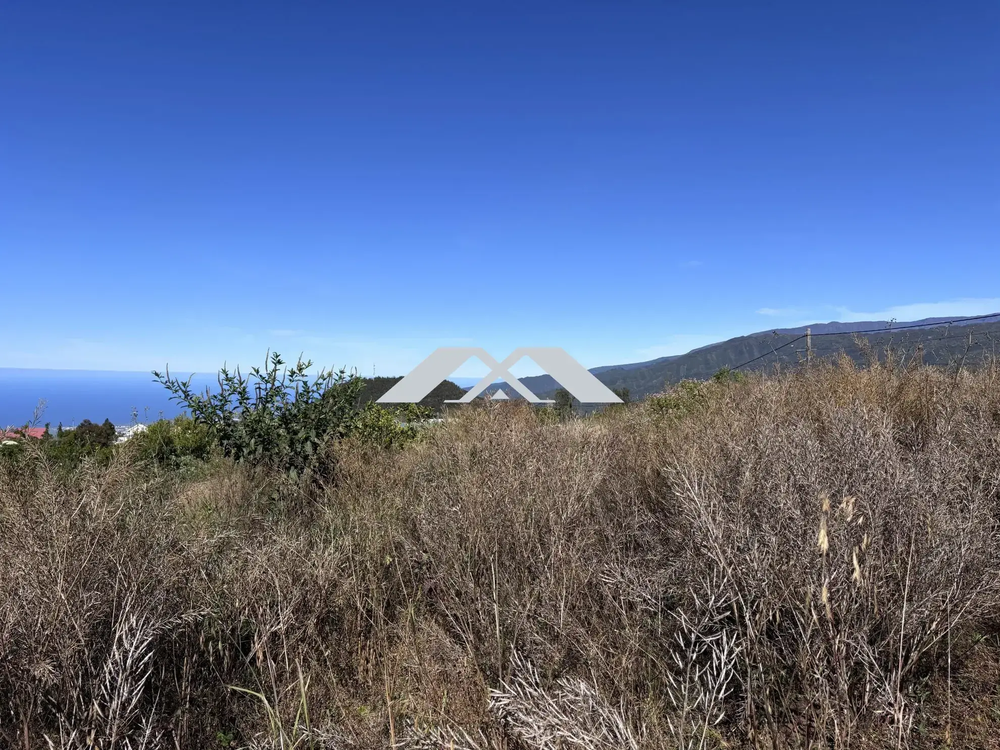 Terrain constructible de 1200 m² à la Plaine des Cafres avec vue mer et montagne