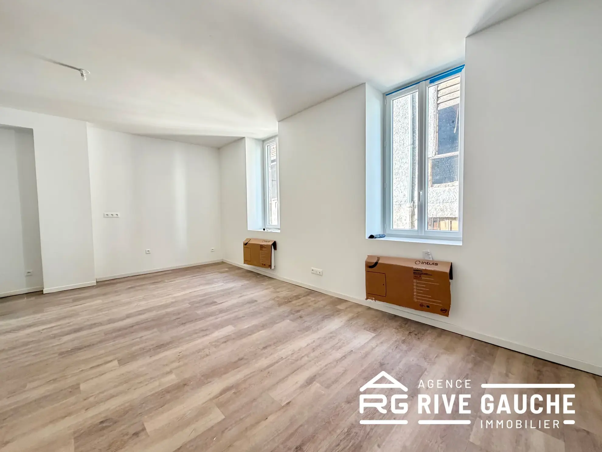 Appartement T1 rénové au centre de Beaurepaire avec vue dégagée